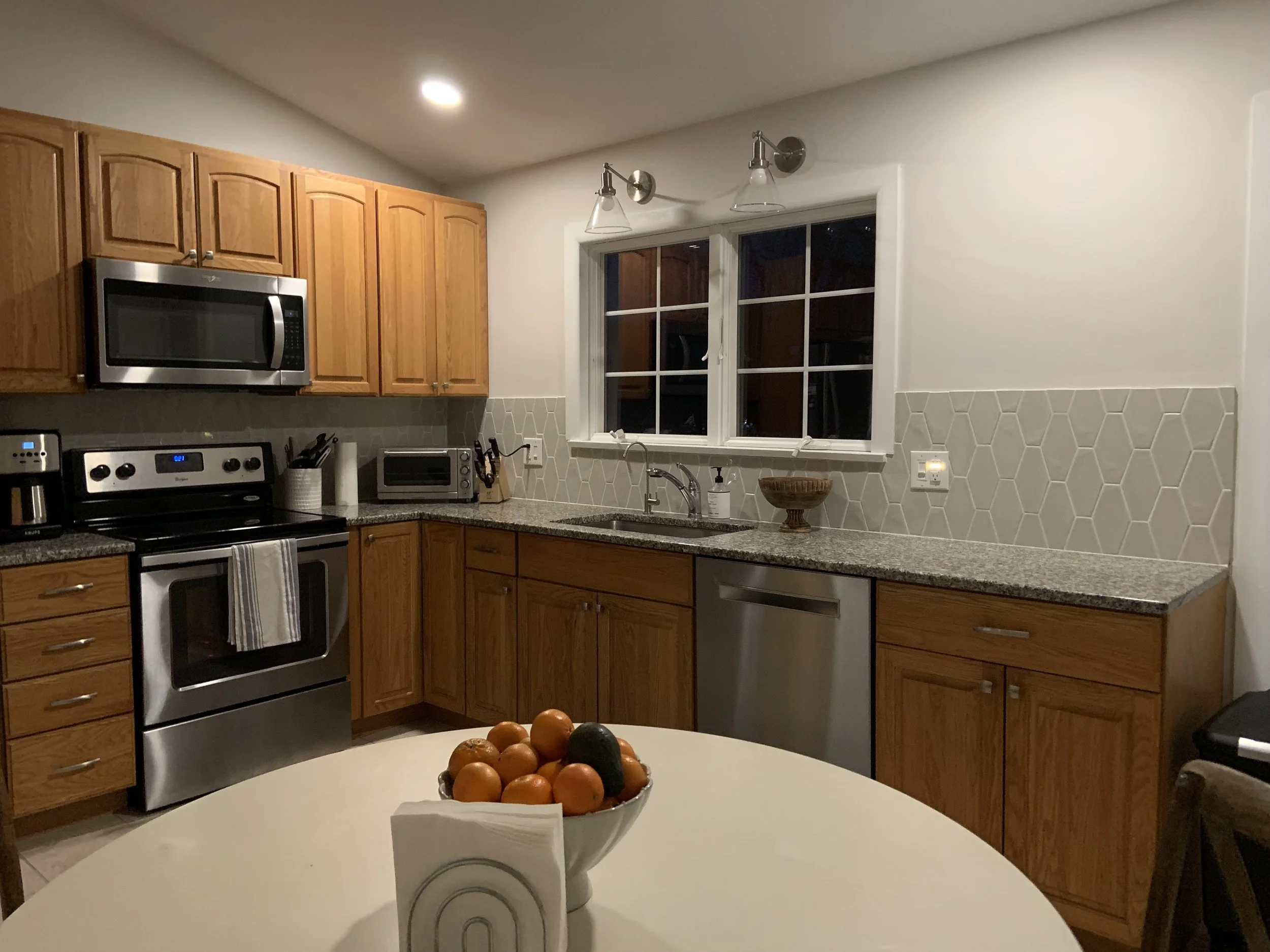 Kitchen backsplash with hexagon tile.