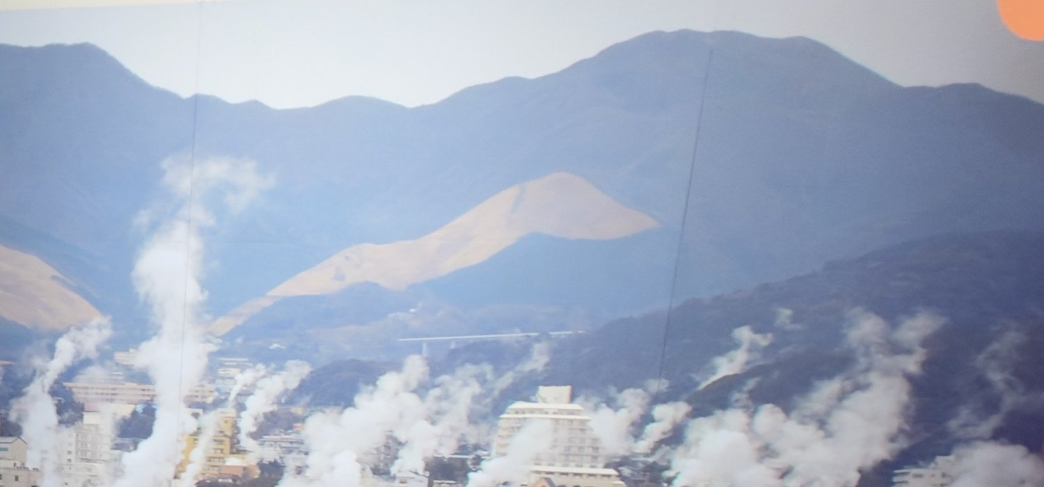Geothermal steam rising through Kannawa in Beppu