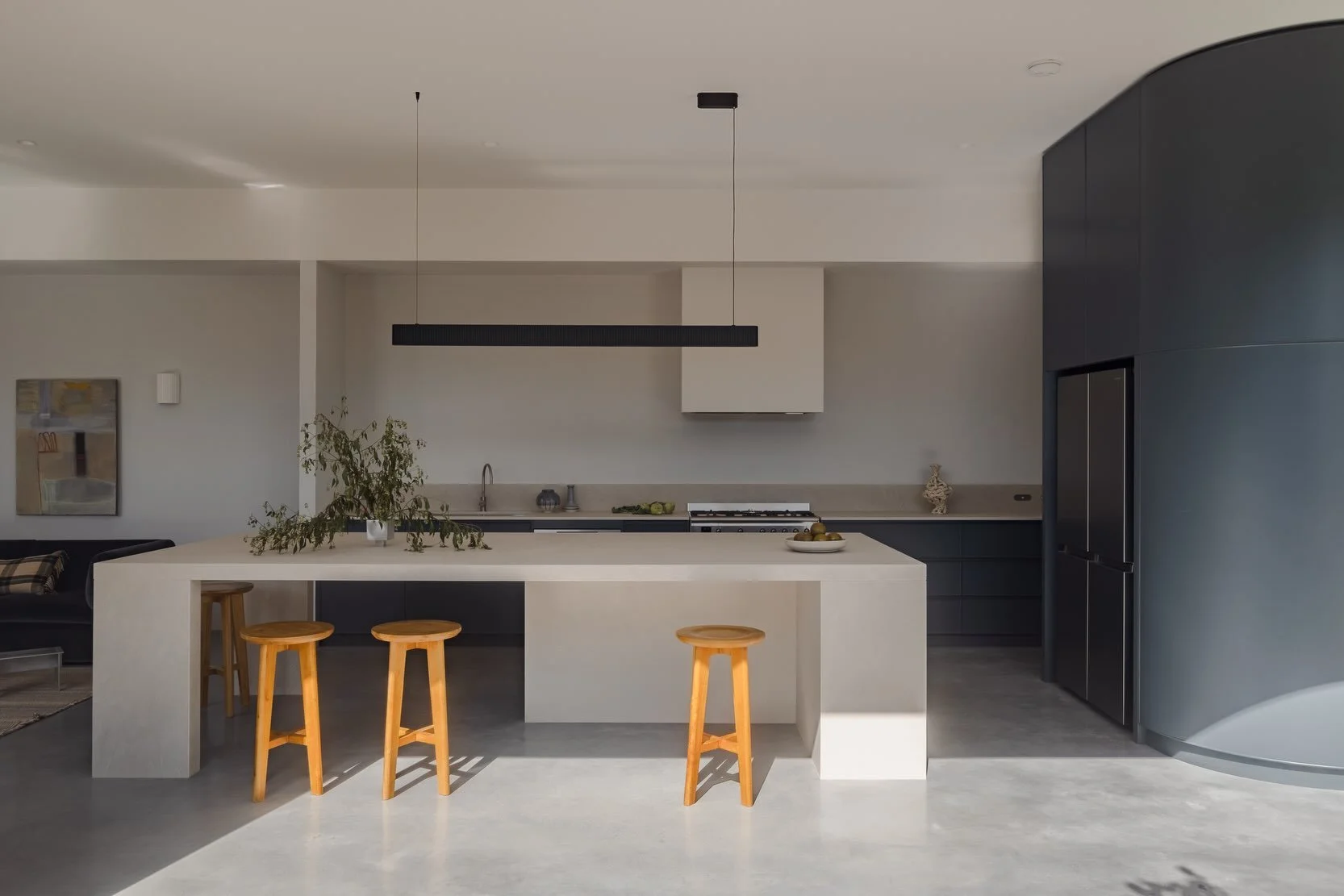 Francis St - Alterations + Addition

With limited space to the rear of this renovation, the kitchen has an oversized island bench that combines the kitchen and dining areas into one.
Losing the separate dining table freed up space for a generous livi