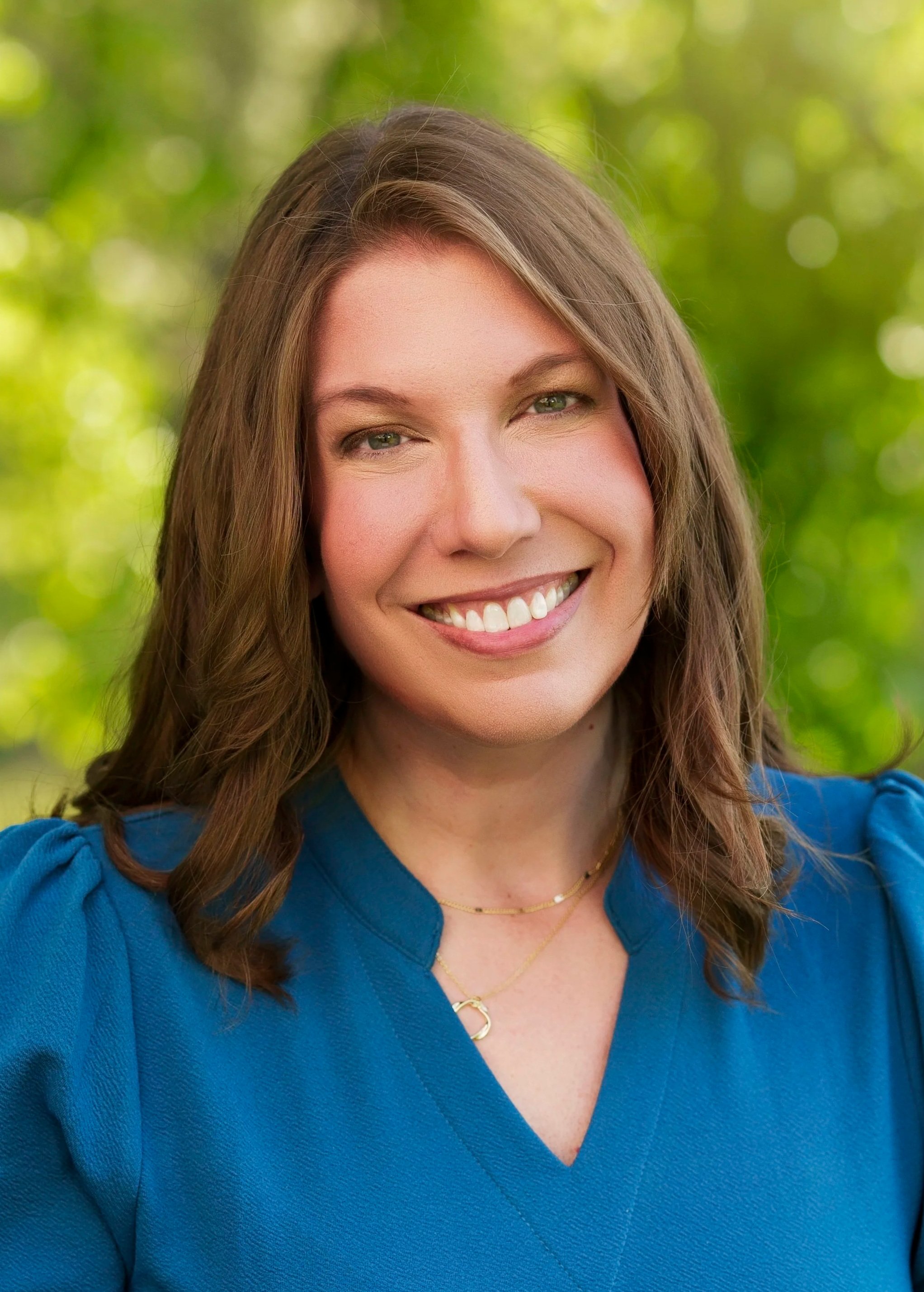 Anna Kisting, a Certified Reiki Master, Reiki Trainer, and Founder of Intuitive Moon Reiki