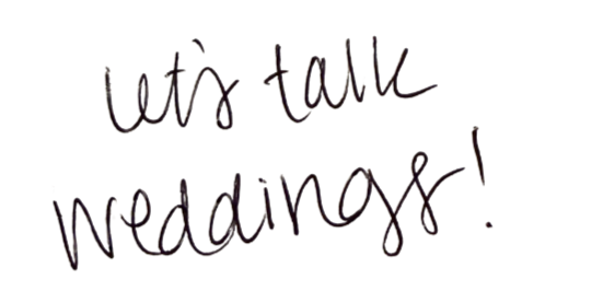 Handwritten message on black background that says "let's talk weddings!"