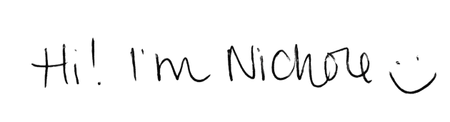 Handwritten text saying, "Hi! I'm Nichole :)", with a smiley face.