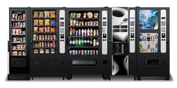 Row of vending machines offering snacks, beverages, and drinks.