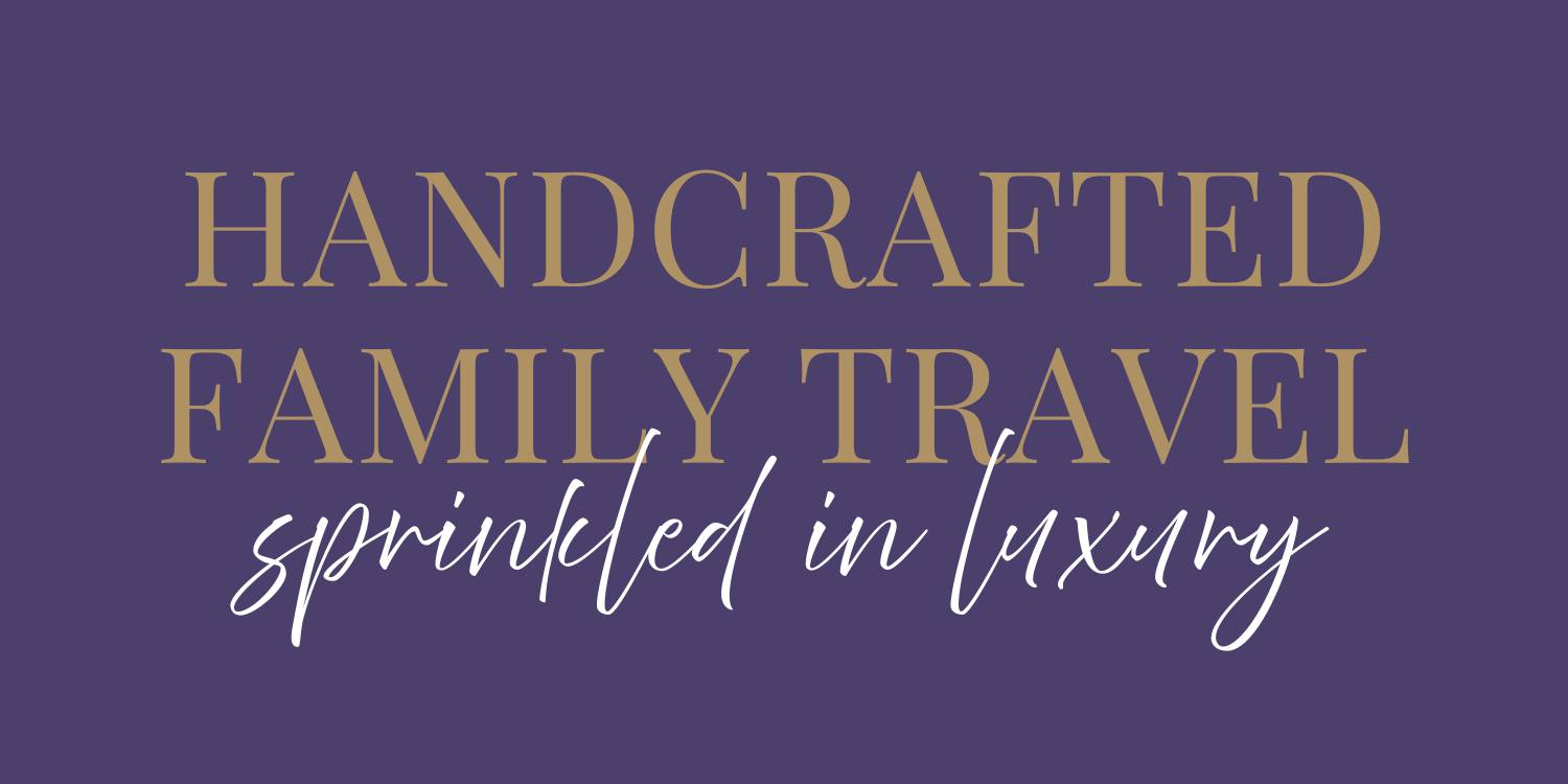 Text on a dark purple background reads: 'Handcrafted Family Travel sprinted in luxury' with 'sprinted in luxury' in a cursive font.