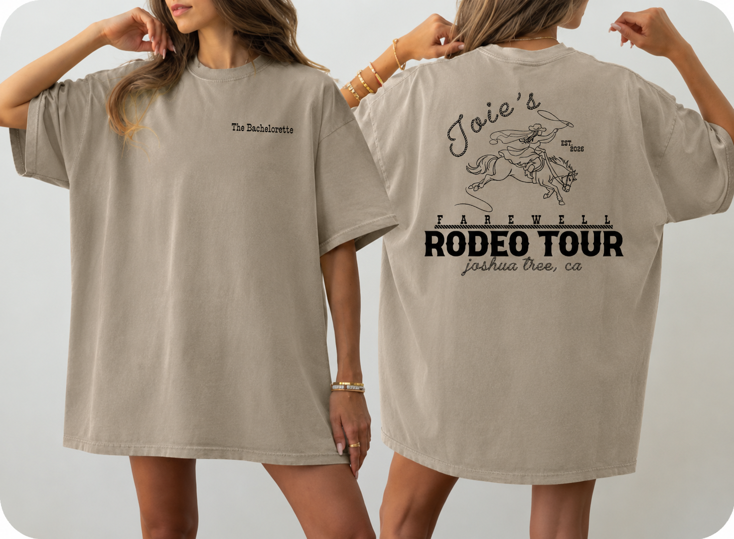 Two women are modeling beige T-shirts with print designs. The woman on the left has a plain front, while the woman on the right shows the back, which features a graphic of a woman riding a horse and text related to a rodeo tour event.