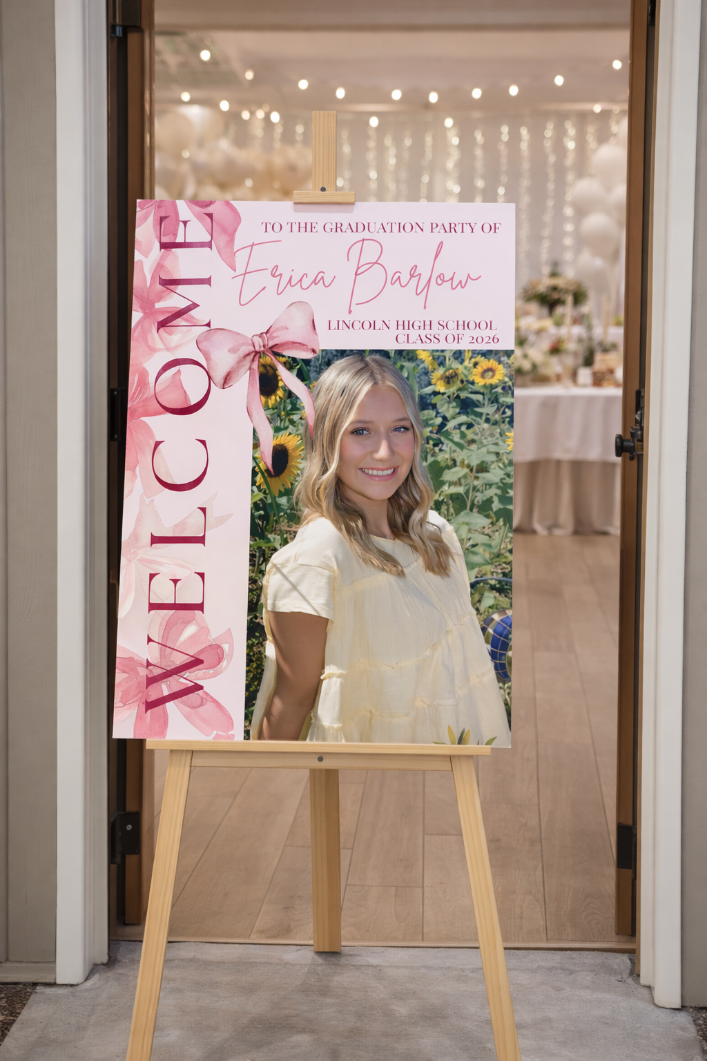 Poster for Erica Barlow's high school graduation party, featuring her smiling portrait with sunflower background, pink ribbon design, and pink text.