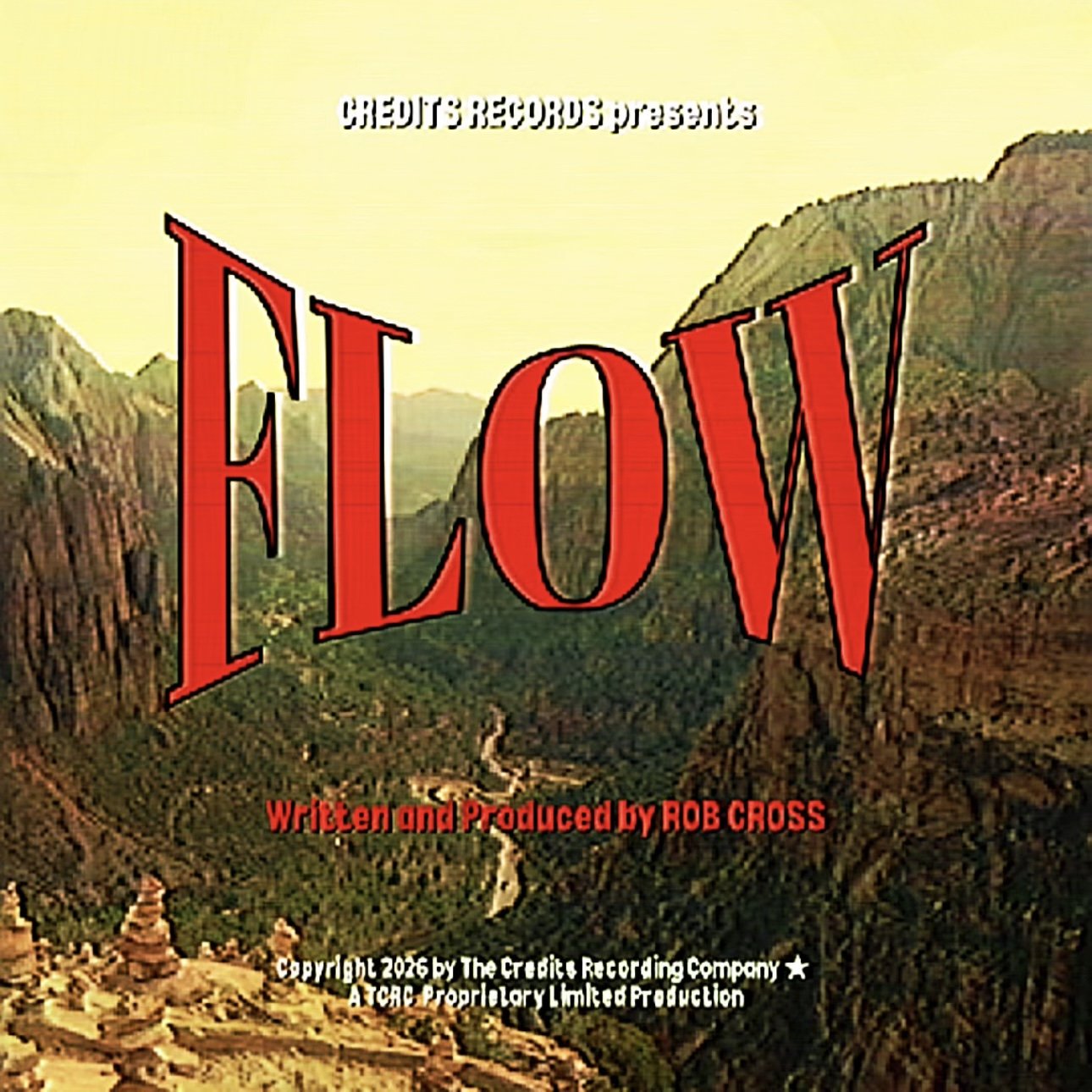 Title screen of the film 'Eleven' showing a valley with mountains in the background and a winding river with text overlaying reading 'CREDITS RECORDS presents' at the top and 'Written and Produced by ROB CROSS' and copyright information at the bottom.