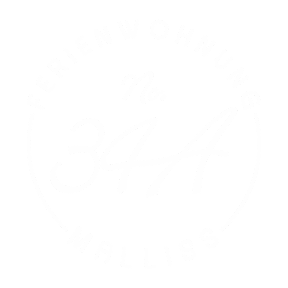 Ein schwarzes Logo mit weißen Schriftzug, der den Namen "No. 34" und die Wörter "Freundwohngung" und "Malliss" umkreist.