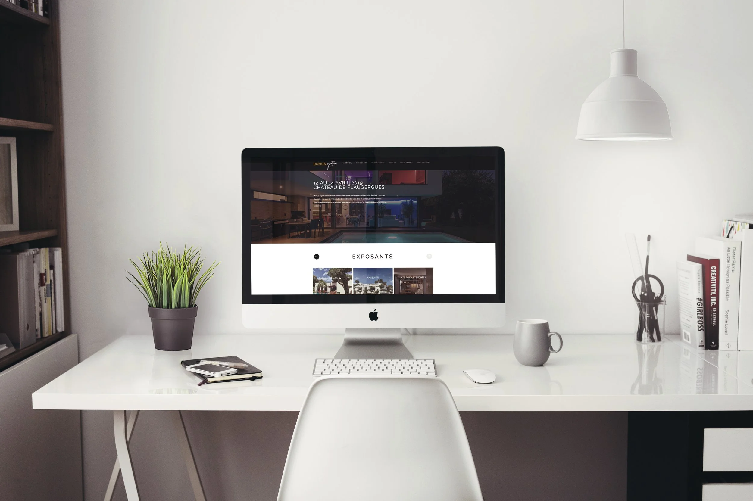 Site web du salon Domus présenté sur un mockup d'écran