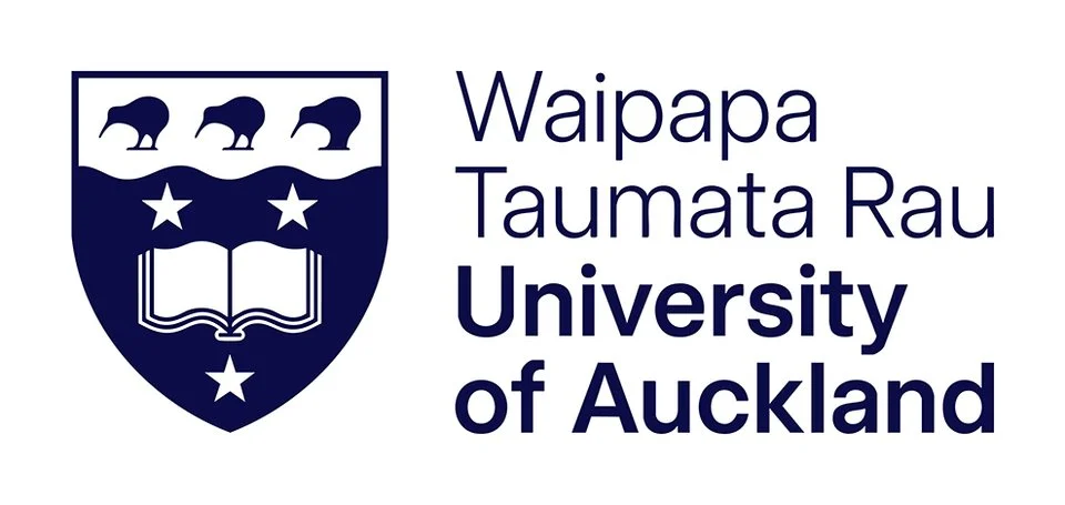 The logo of the University of Auckland, featuring a shield with three birds, stars, and an open book, alongside the university's name in text.