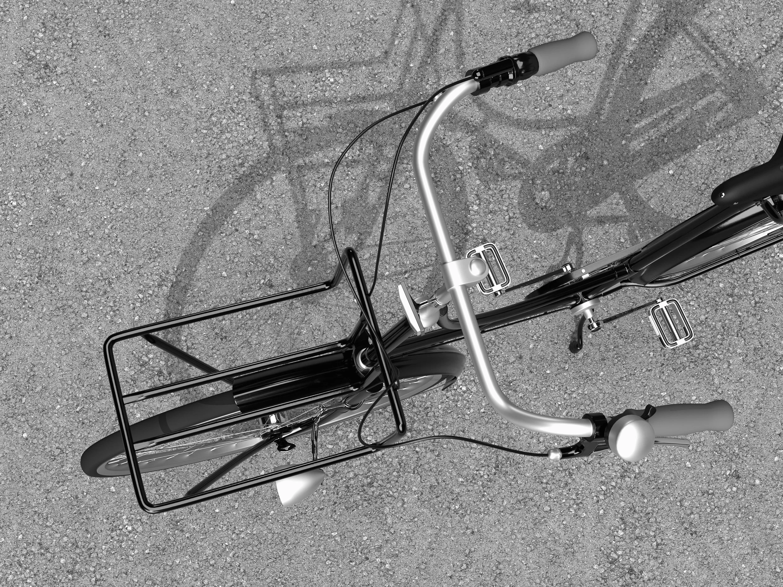 Top view of a black electric bicycle on gray asphalt road, showing handlebars, front basket, and part of the frame.