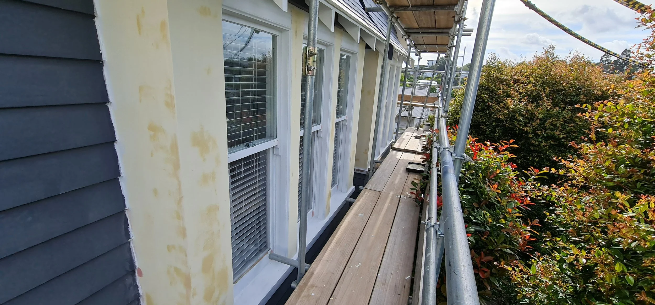 Timber repairs and surface preparation before painting