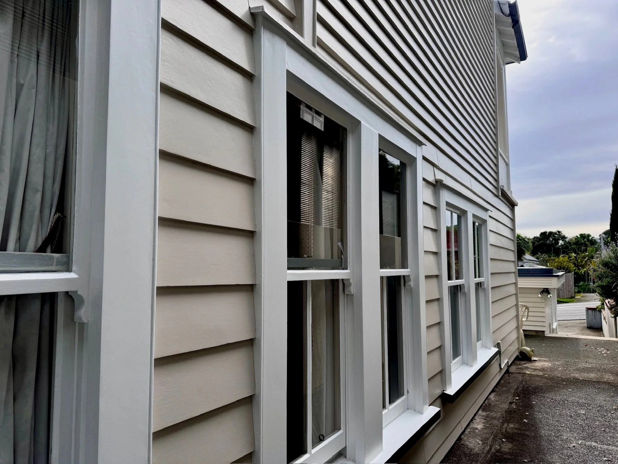 Freshly painted weatherboards and timber details