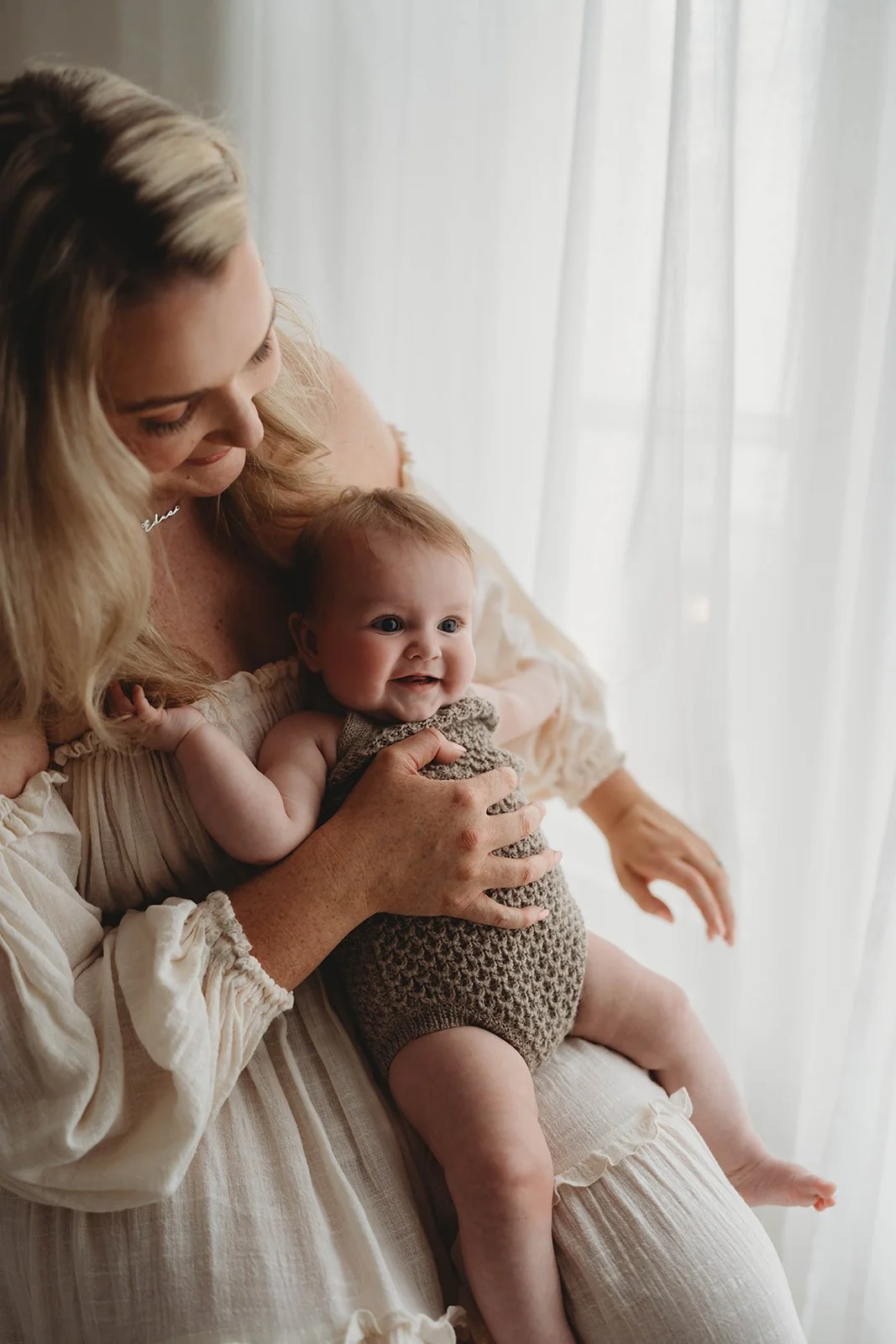 “What age is best for a newborn photoshoot?”