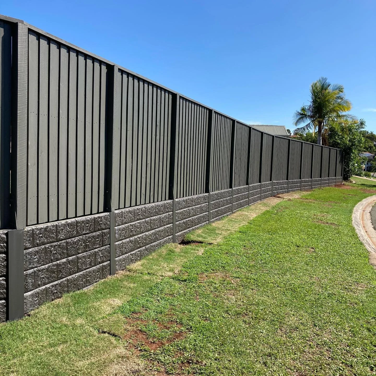 timber fencing and concrete sleeper retaining wall built in Labrador