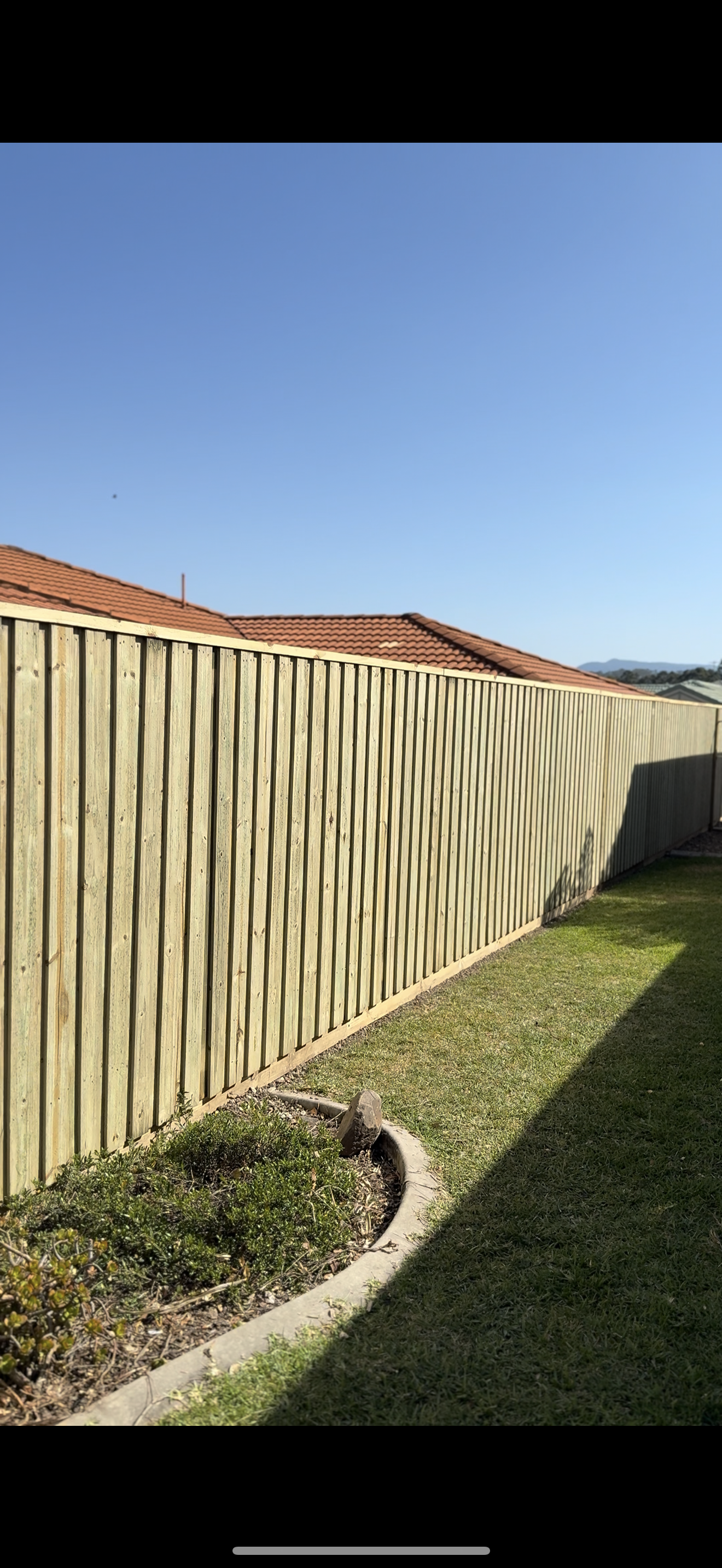 Boundary timber fence in nerang