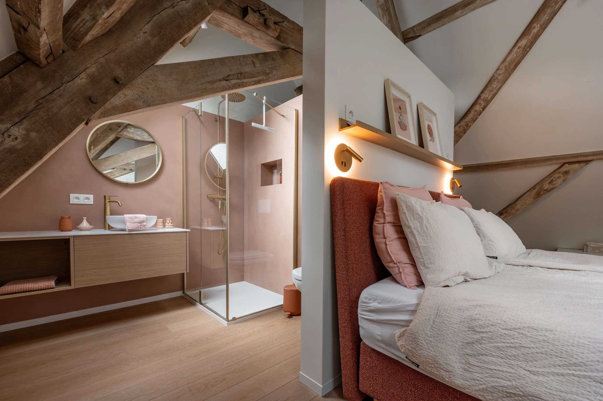 Large bedroom with kingsize double bed, single bed and ensuite bathroom at Barn of Bliss corporate offsite venue near Bruges, West Flanders