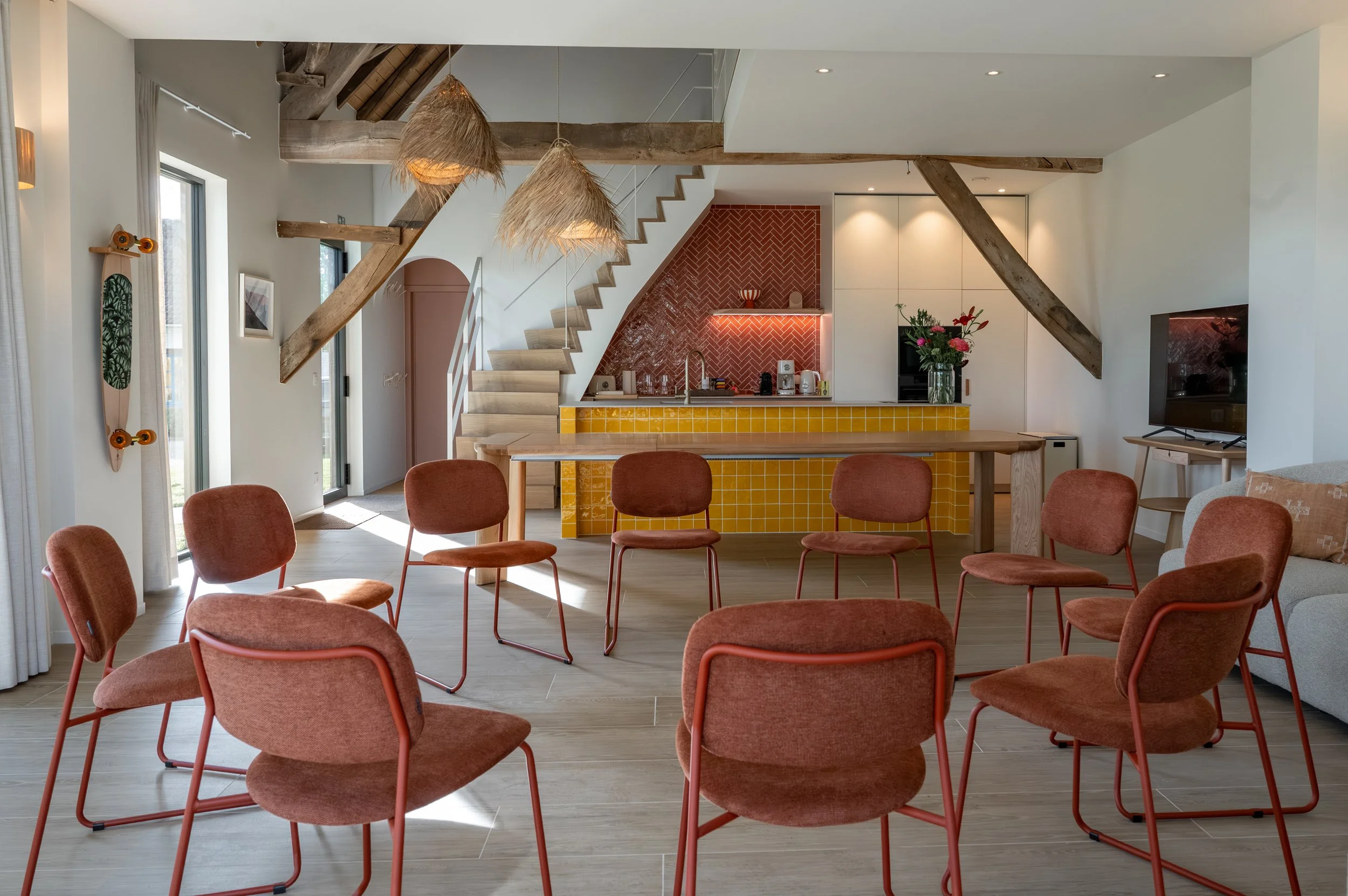Large room with chairs in circle setup for trainings or workshops, for 10 to 12 people, at Barn of Bliss corporate offsite venue near Bruges, West Flanders