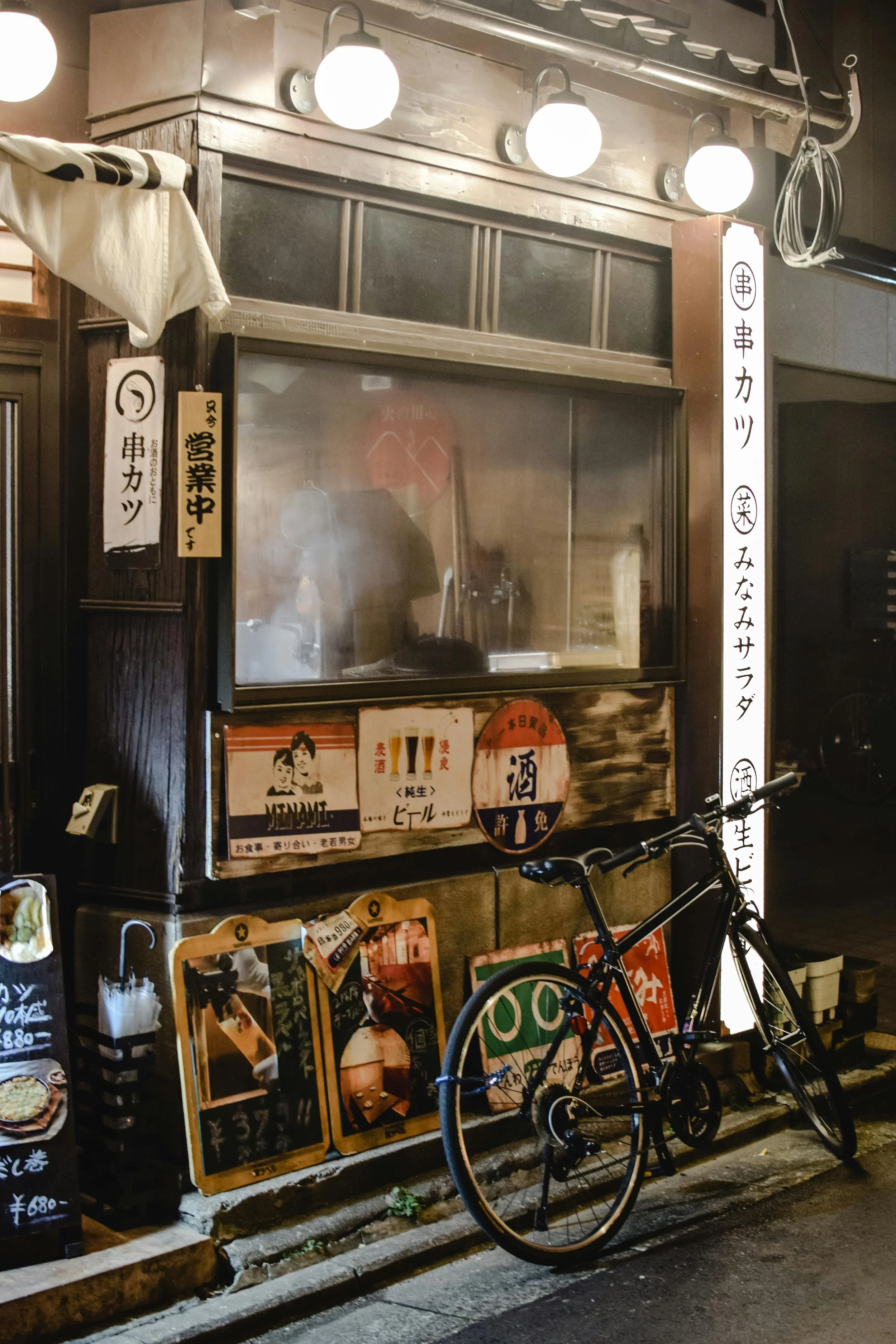 Tokyo street scene bicycle outside a noodle stand