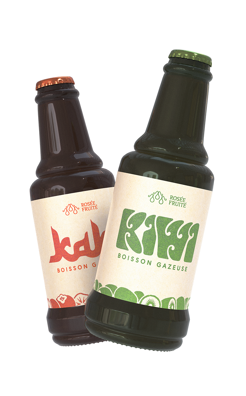 Two dark glass bottles of fruit beverages leaning against each other, one with a red cap and label with red and orange text, and the other with a green cap and label with green text, on a plain background.