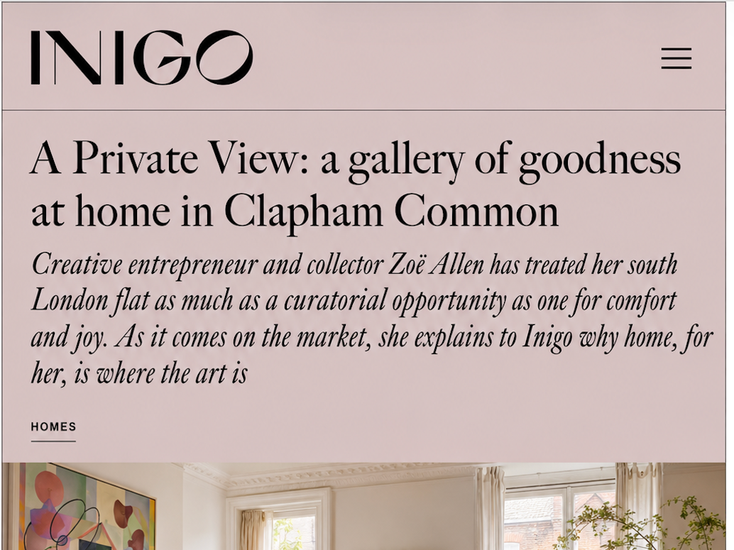 Screenshot of a webpage titled 'INIGO' with an article about a private home in Clapham Common, featuring a light pink background, black text, and an image showing a living room with white walls, large windows, and plants.