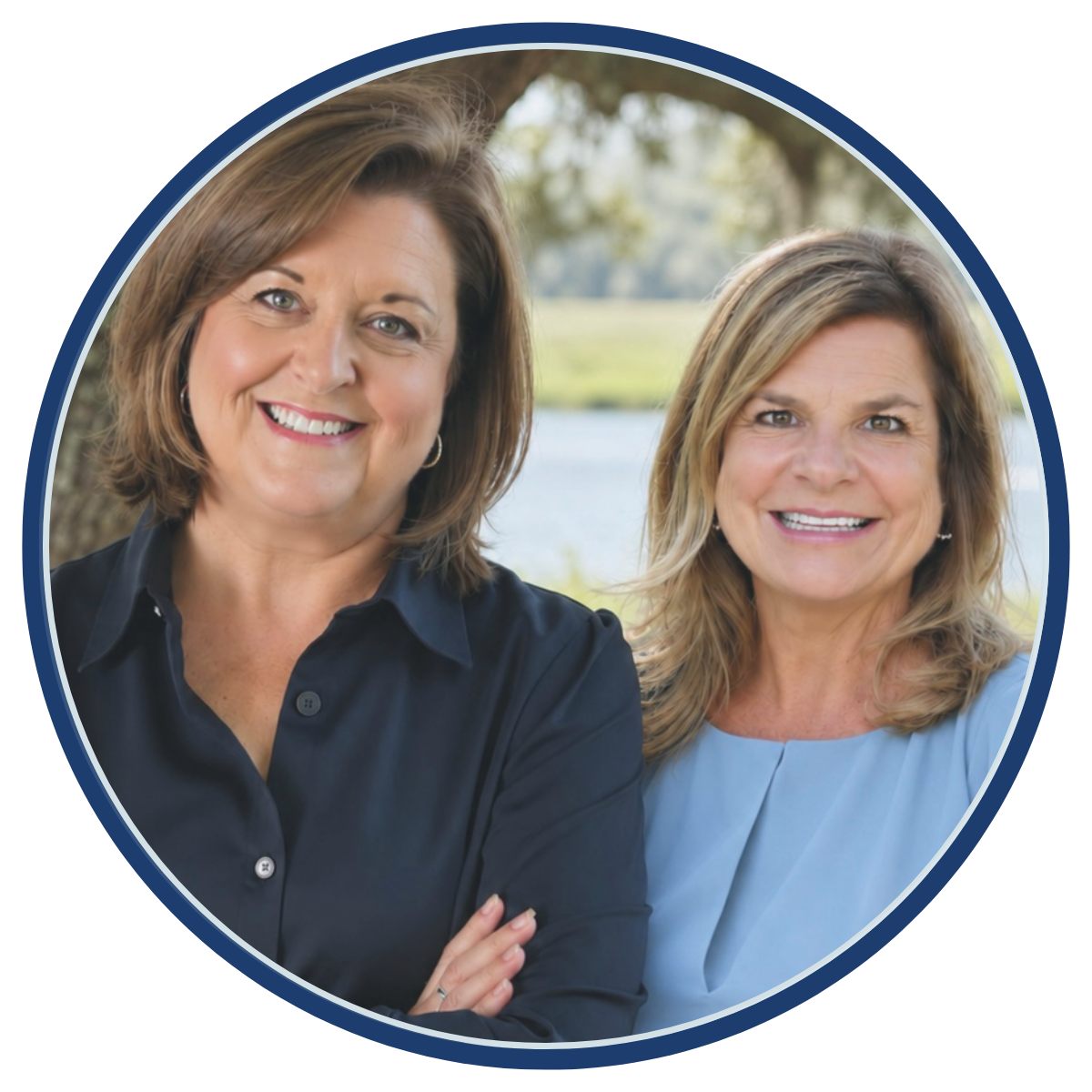 Headshot of two women in front of marsh