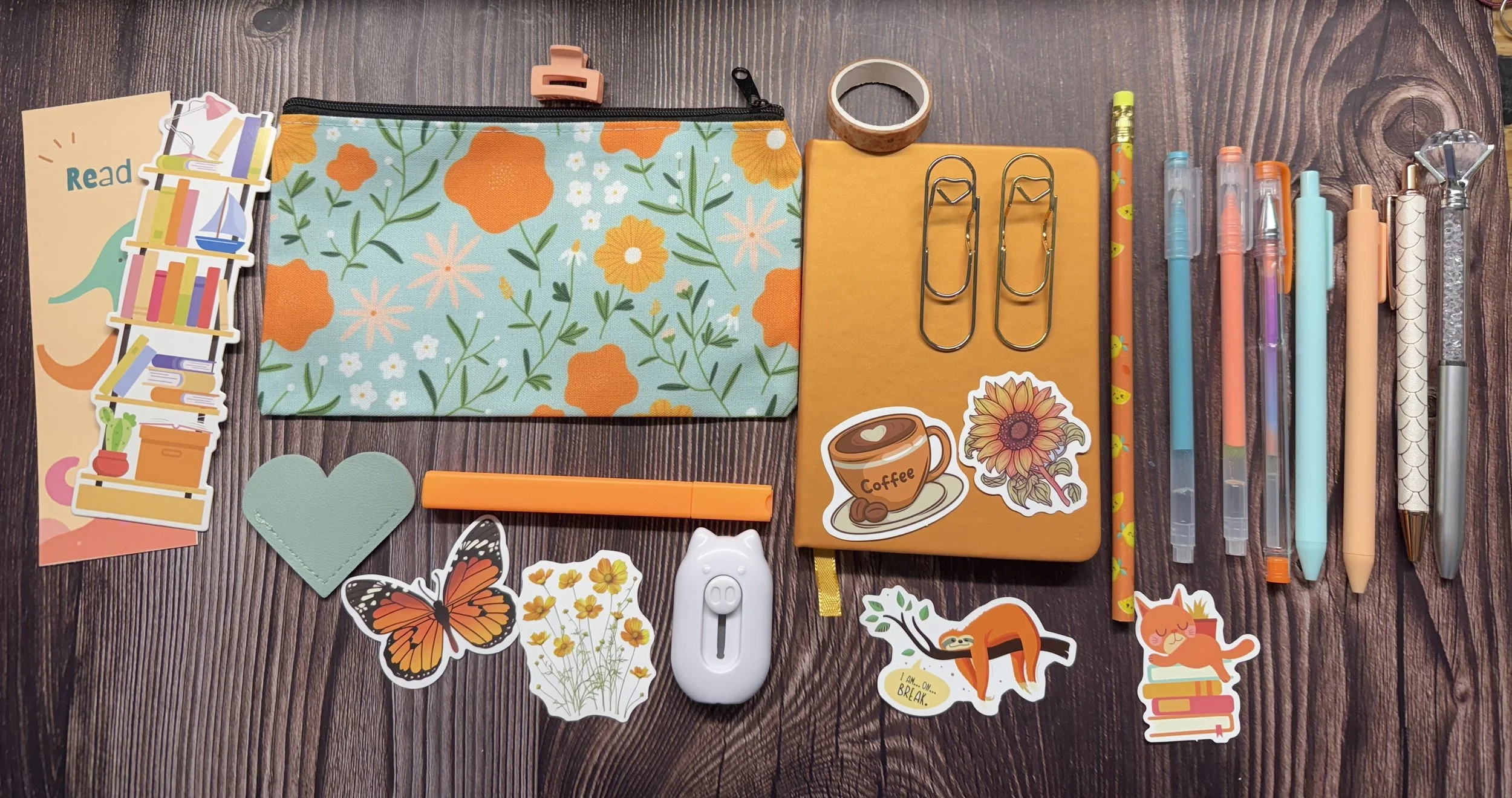 Orange and teal stationary mystery box.jpeg