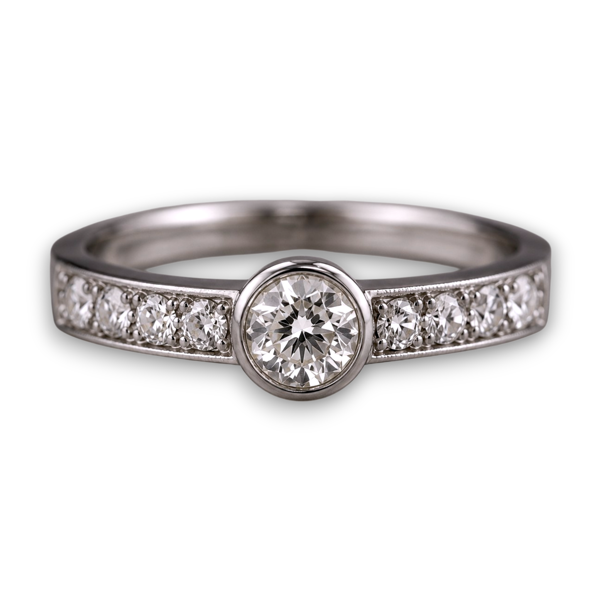 Vintage-inspired platinum engagement ring with a 1ct round natural diamond, channel-set shoulders and handcrafted detailing. Maximum durability to pass down to generations to come.