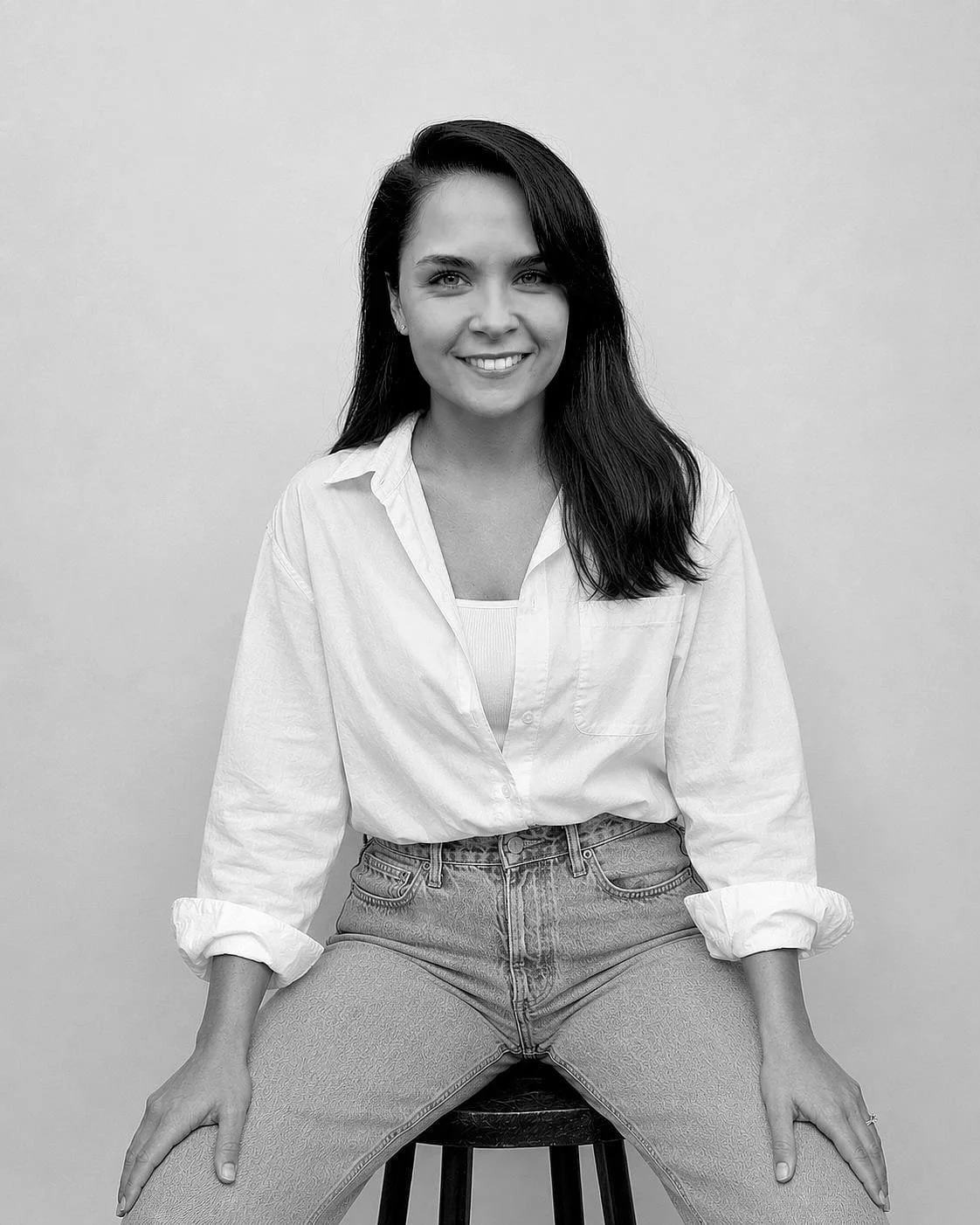Black and white portrait of Xenia Meler Bech, founder of Meler Bech Personal Jeweller, specialising in bespoke engagement rings, handcrafted wedding bands, coloured gemstone jewellery and custom fine jewellery.