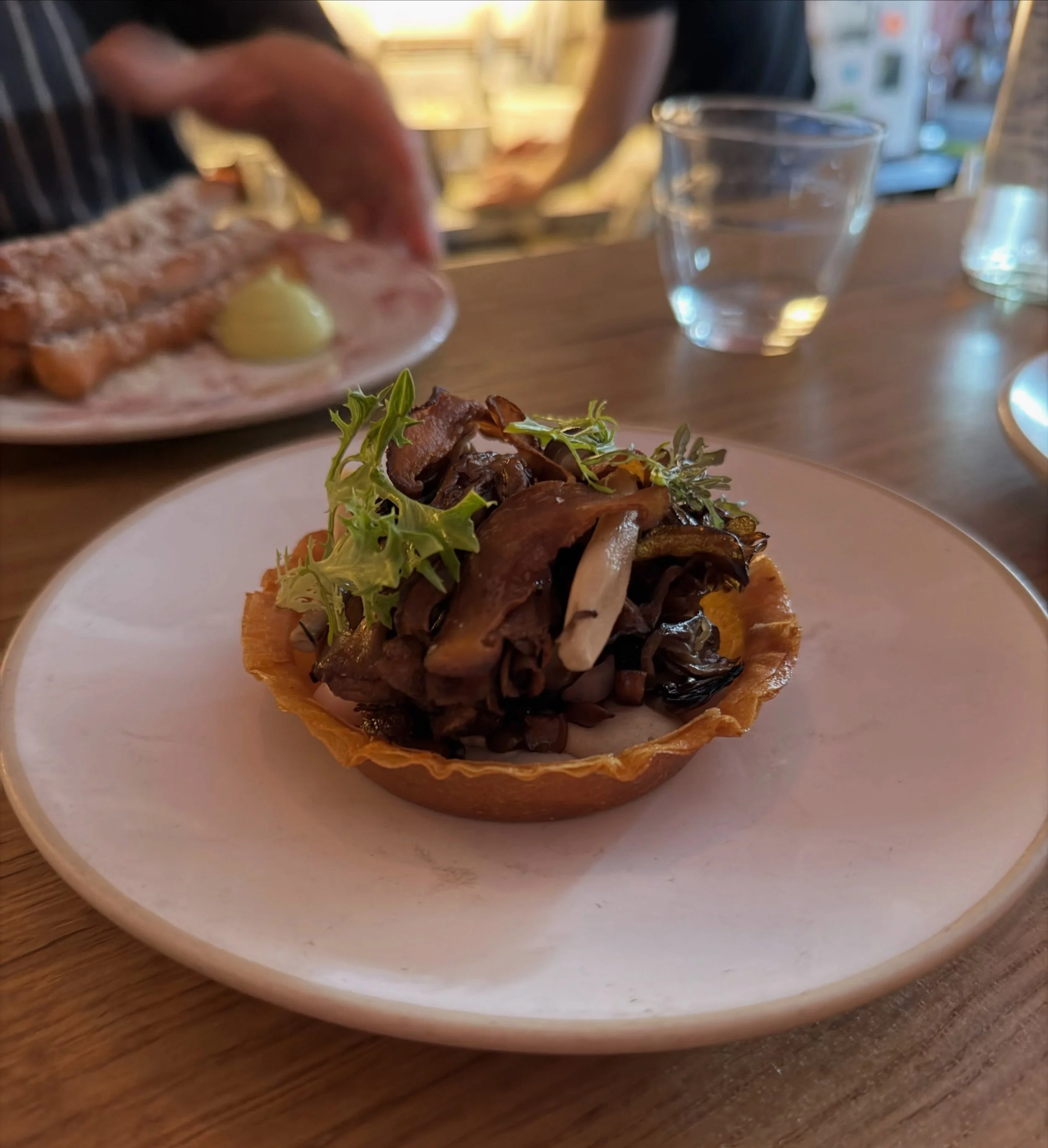THIS TARTLET IS OH MY FUCKING GOD 🍄&zwj;🟫

Hear me out, a delicate and crispy brick pastry, a generous unctuous cep cream, a fantasia of grilled maitake, pickled Shimeji and other less important mushrooms. 
It definitely deserves a moment because y