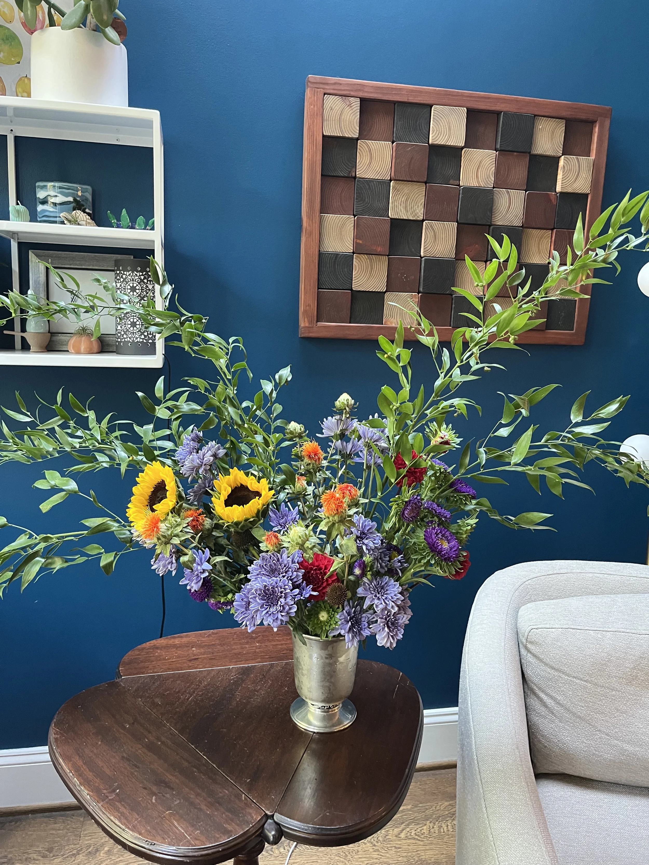 A large bouquet includes a rainbow of flower colors.