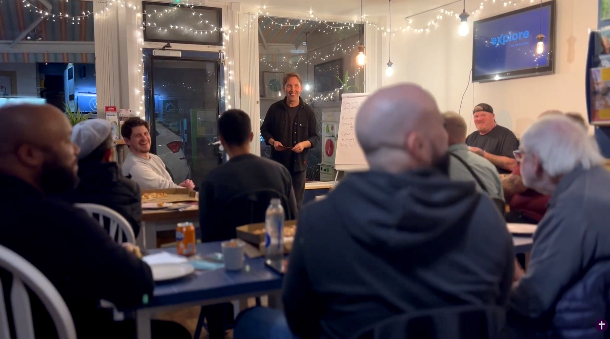 People seated at tables in a cafe in Kempston at an Explore Course, investigating what life, faith and the claims of Jesus are all about. #Explore #Jesus #Faith #Hope