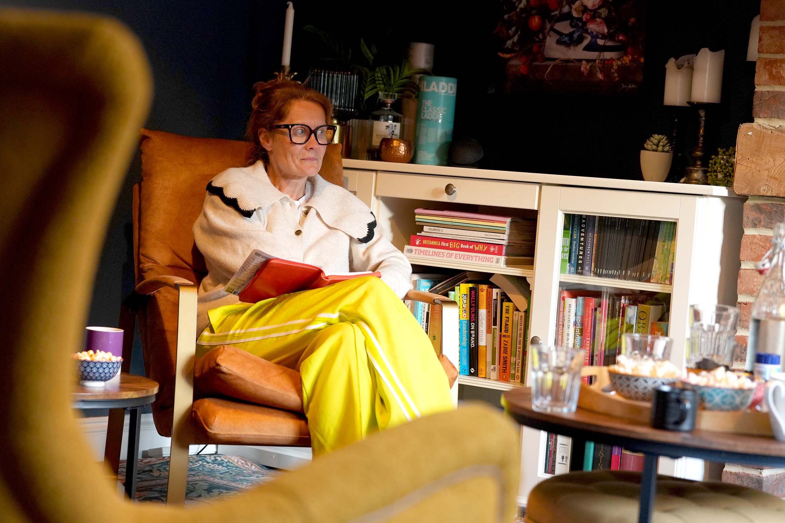 A women sits and engages in conversation during one of the churches homegroups that run during the week.