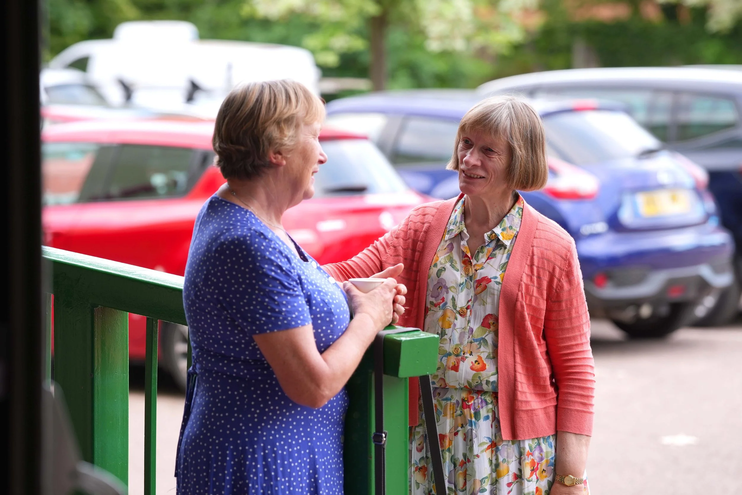 Two women talking outdoors, after a Sunday Service at Grace Community Church. #Church #Community #Grace