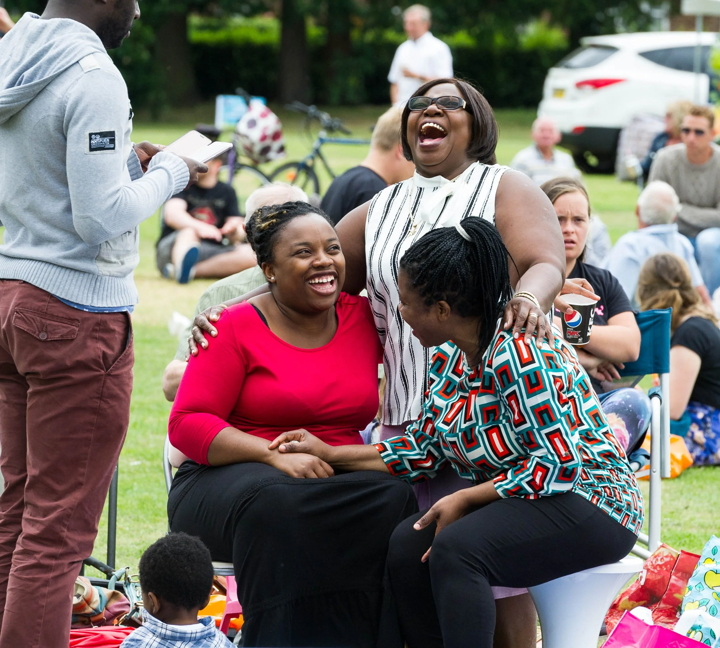 Smiling, laughing women at our Chill in the Park community festival. #Church #Community #Grace