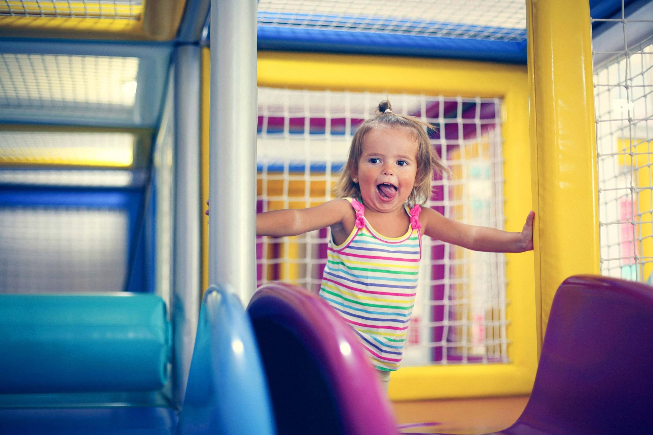 A young girl playing inside an indoor soft-play structure at Dadtime - a monthly group for Dads and kids run by Grace Community Church. #Dads
