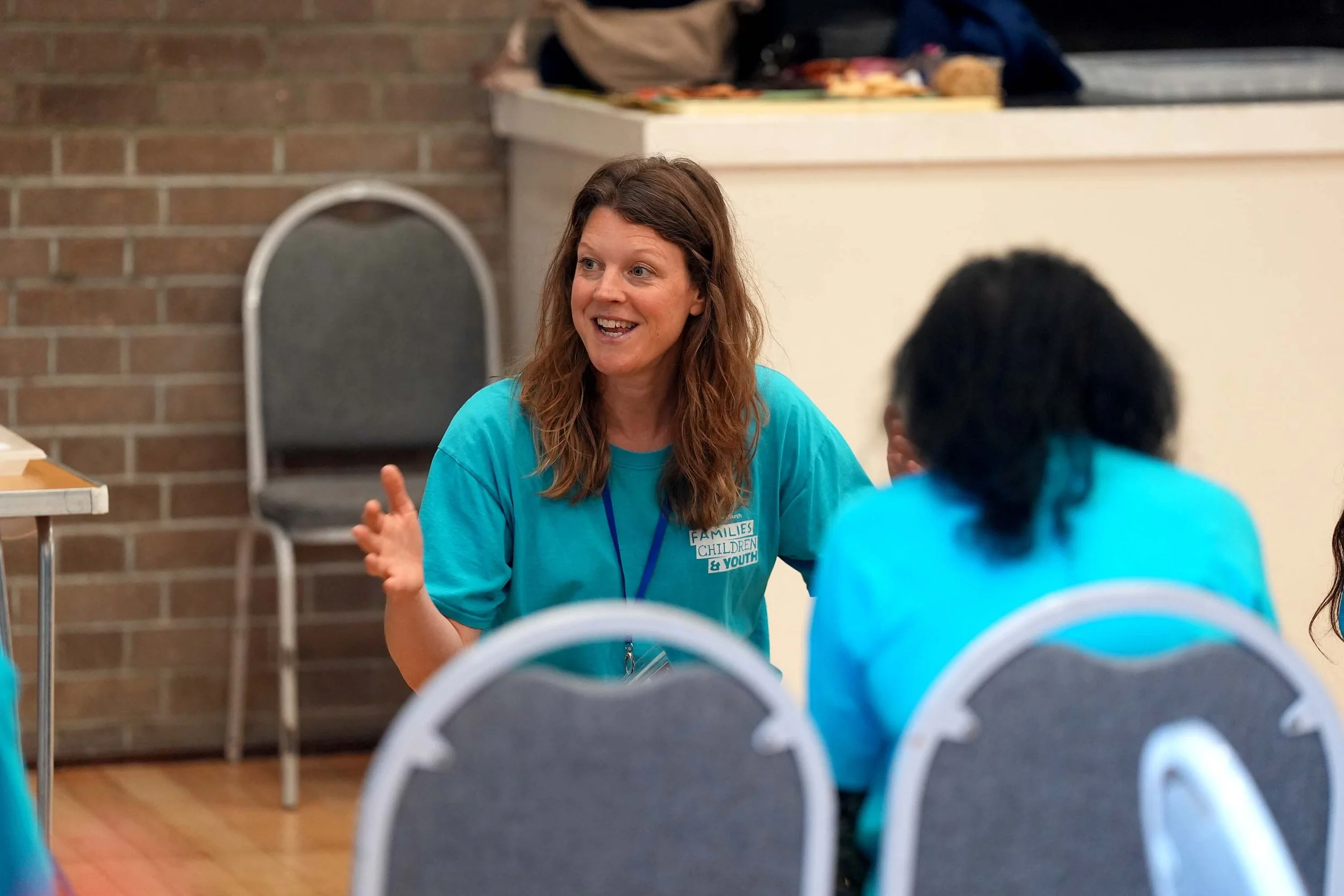 One of the FCY team leads speaking to the team before Playtime.