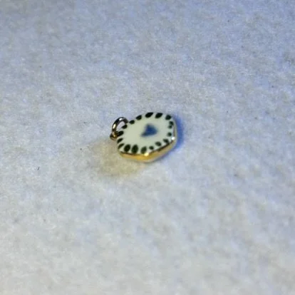 White Hexagon Porcelain Charm with Blue Heart, Green Petals and Gold Rim