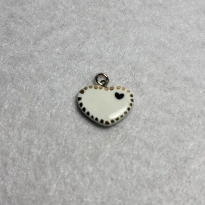 White Porcelain Heart Charm with Black Heart and Gold Border