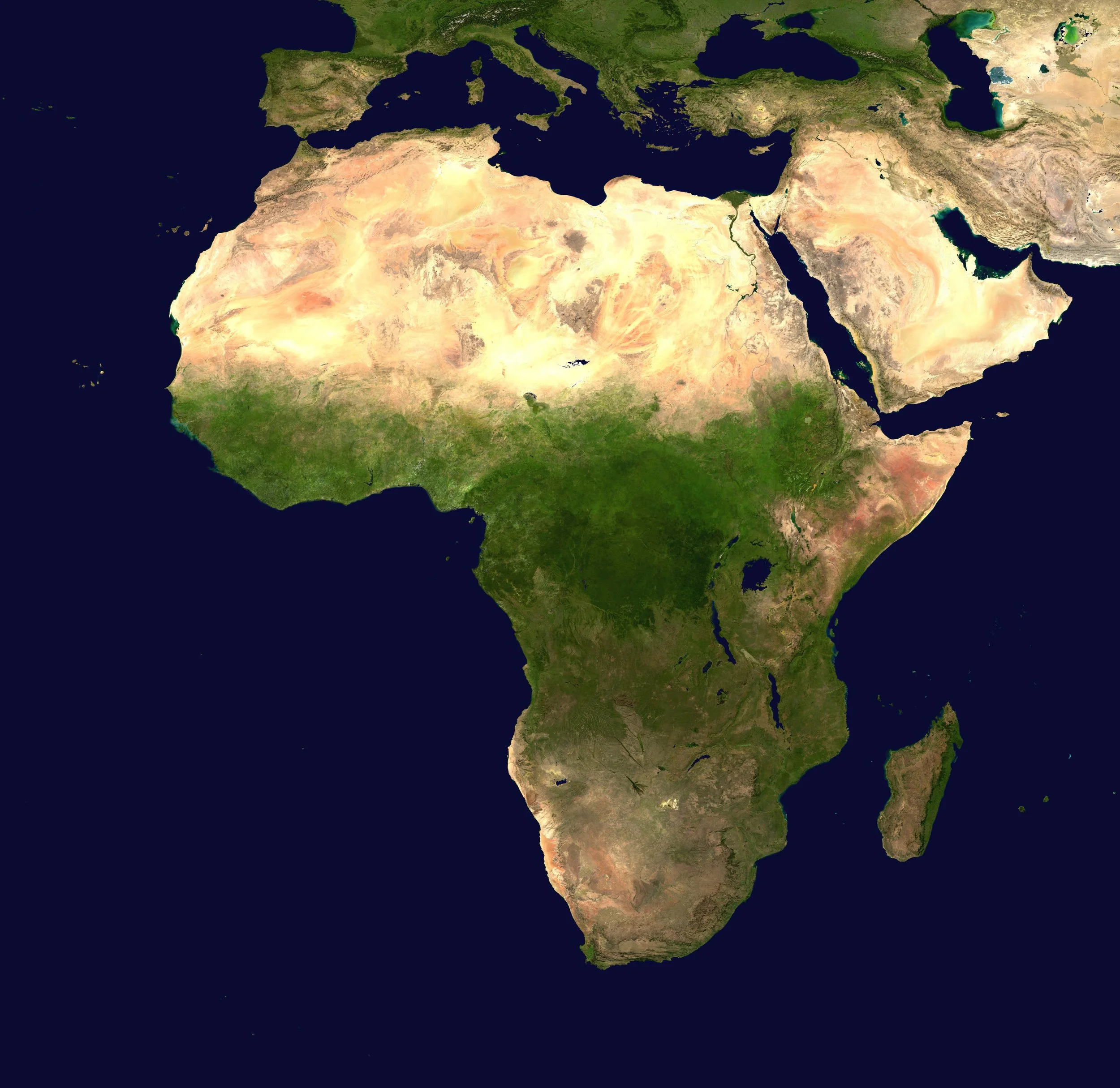 Satellite image of Africa and parts of Europe and the Middle East, showing landmasses, bodies of water, and varied terrain.