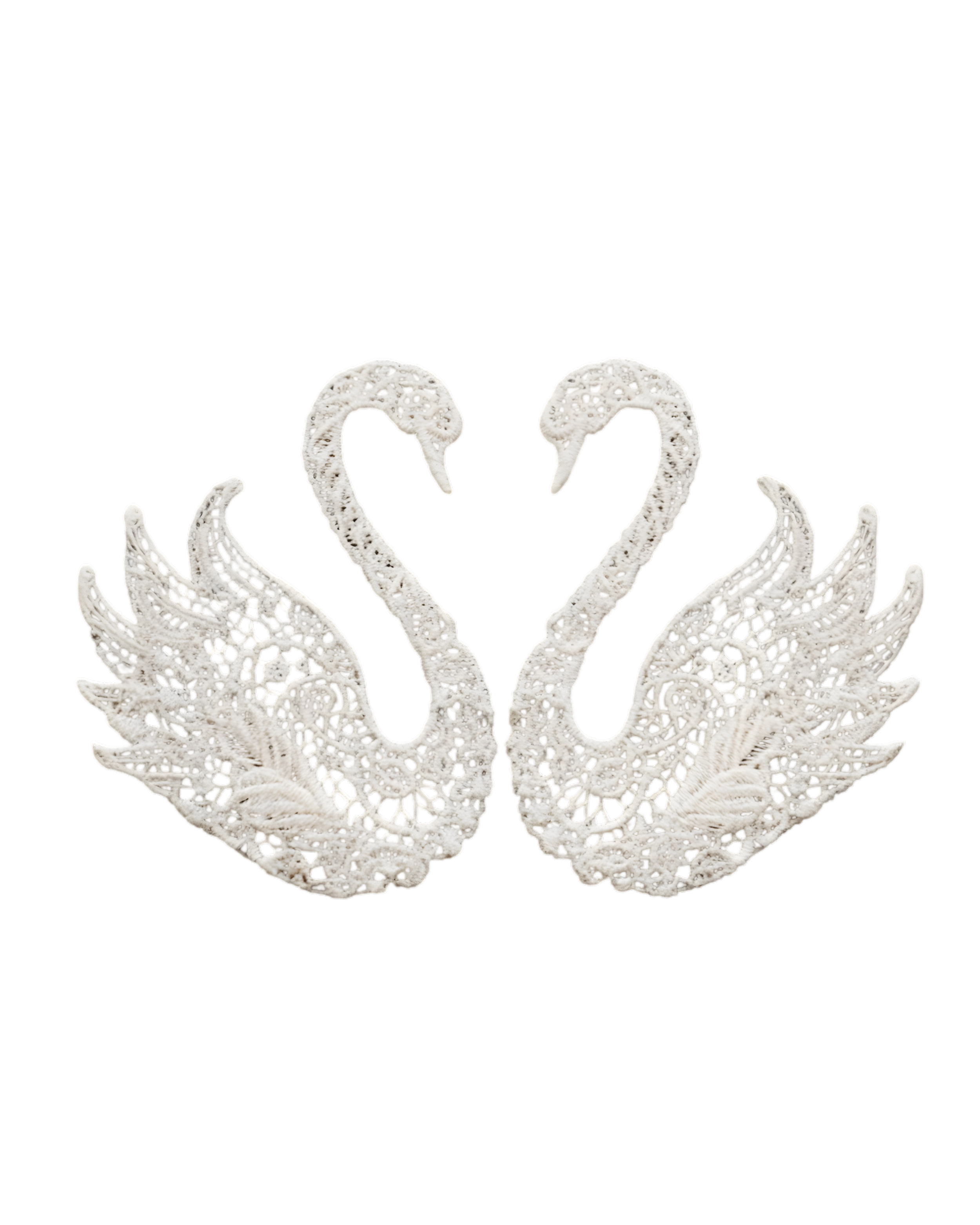 A digital image of a symmetrical ornate decorative design resembling a butterfly or moth with intricate lace-like patterns in white against a black background.