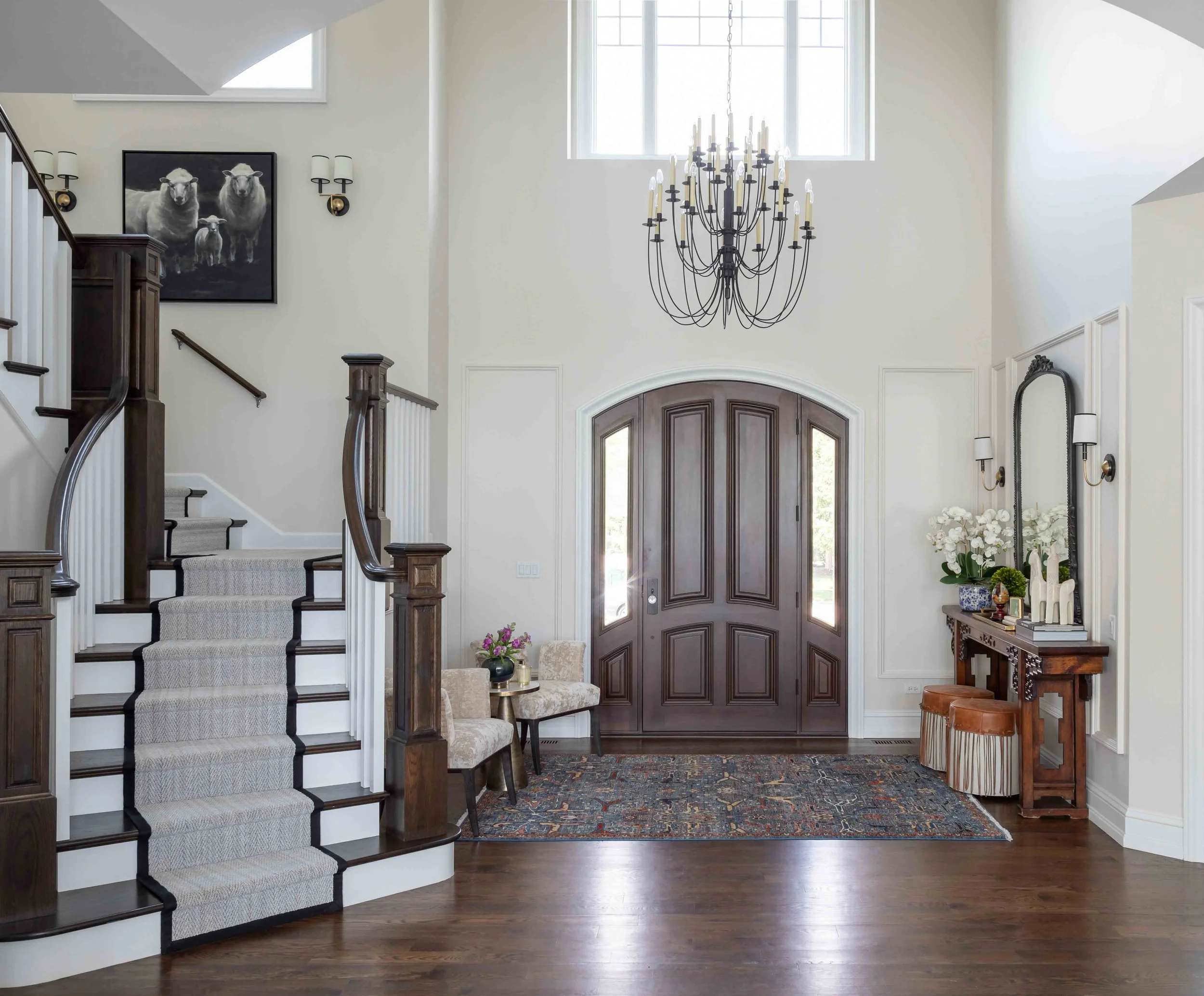 Entrance foyer by Matte & Gloss Interiors - a full-service residential interior design studio serving Chicago and the North Shore with timeless, refined home design.