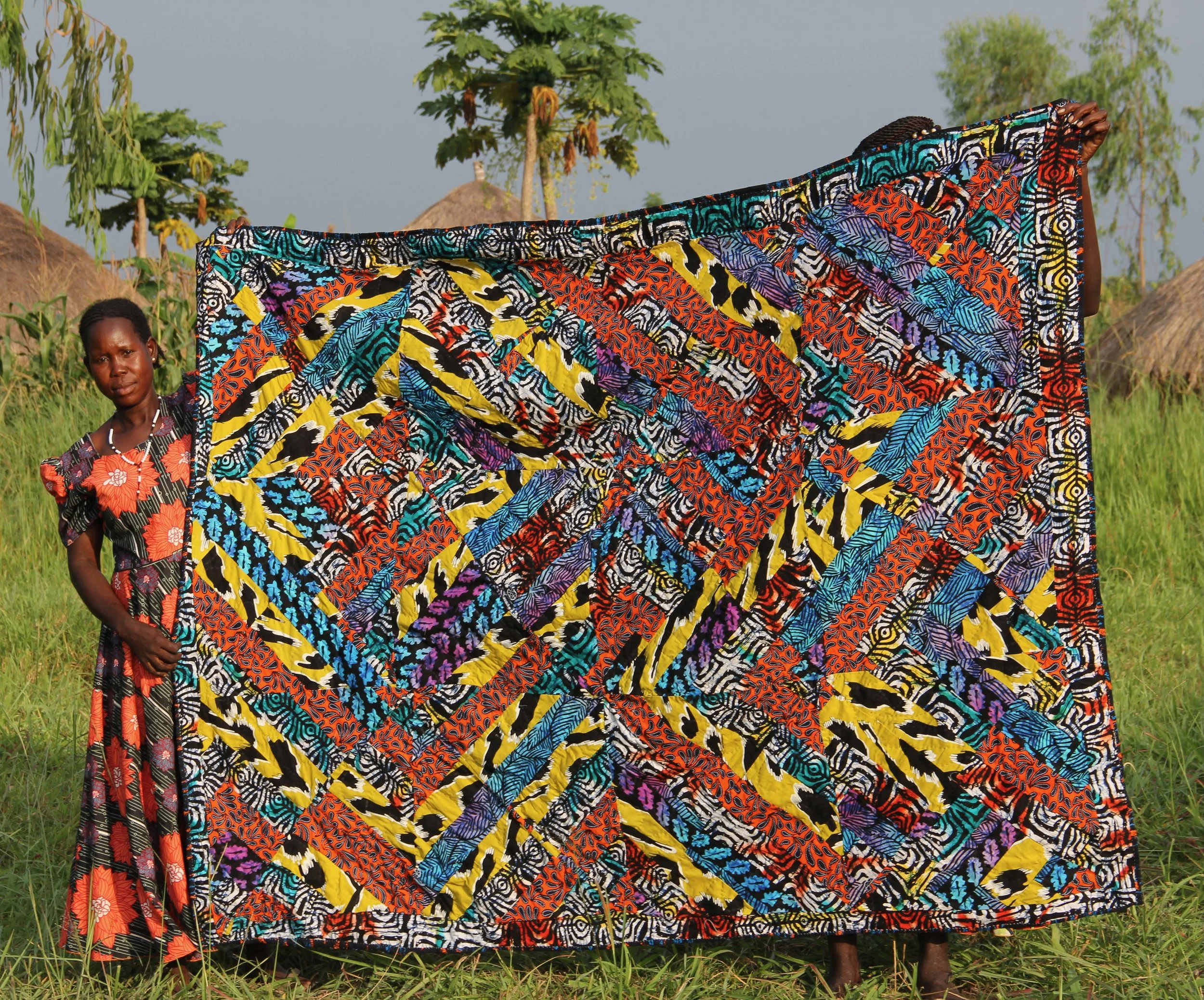 P 27-26 Ajok Flo / Size 63" x 82" / 200,000ugx. / $55