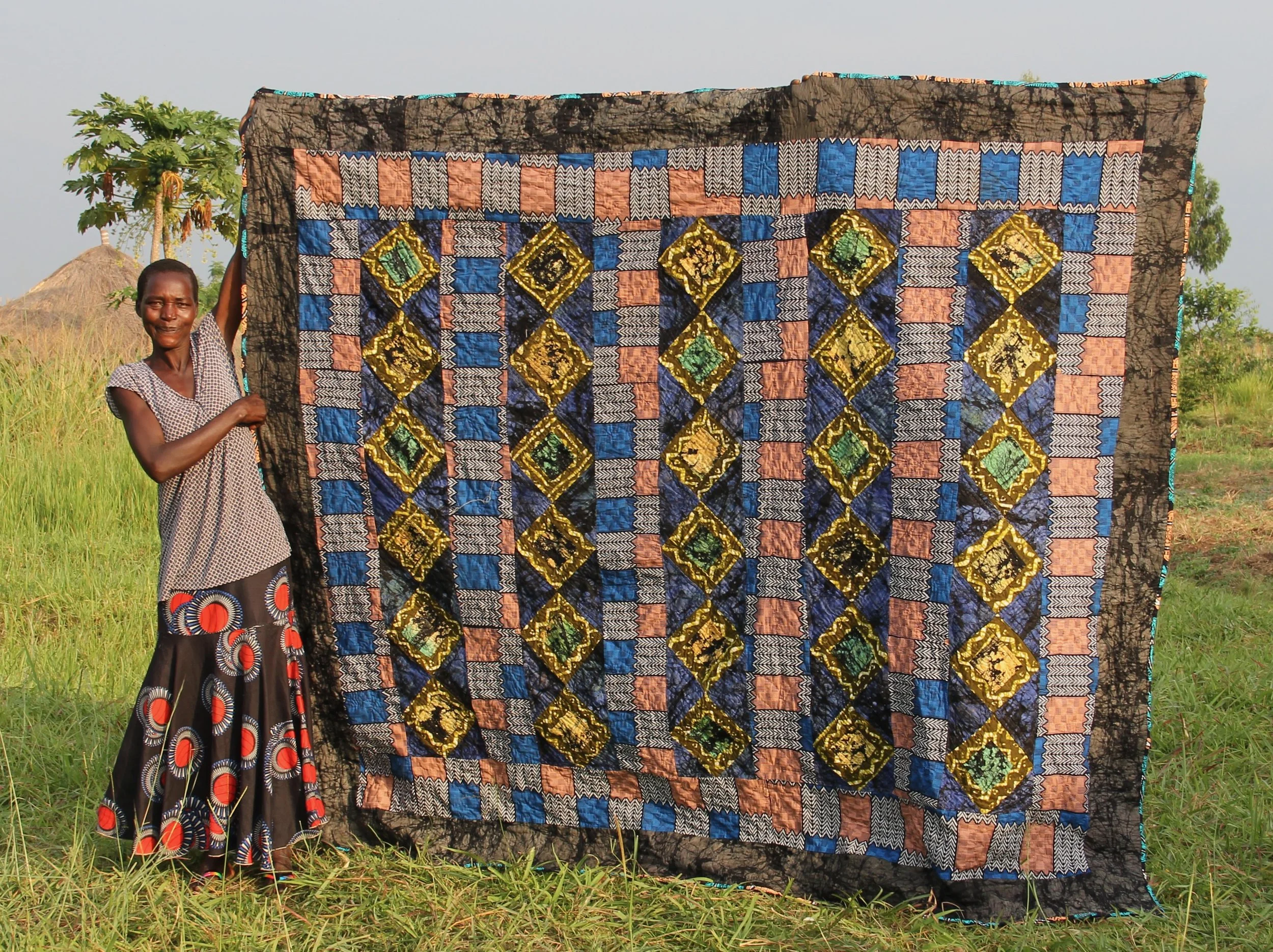 P31-26 Lakot Agnes / Size 74" x 100" / 275,000ugx. / $75 