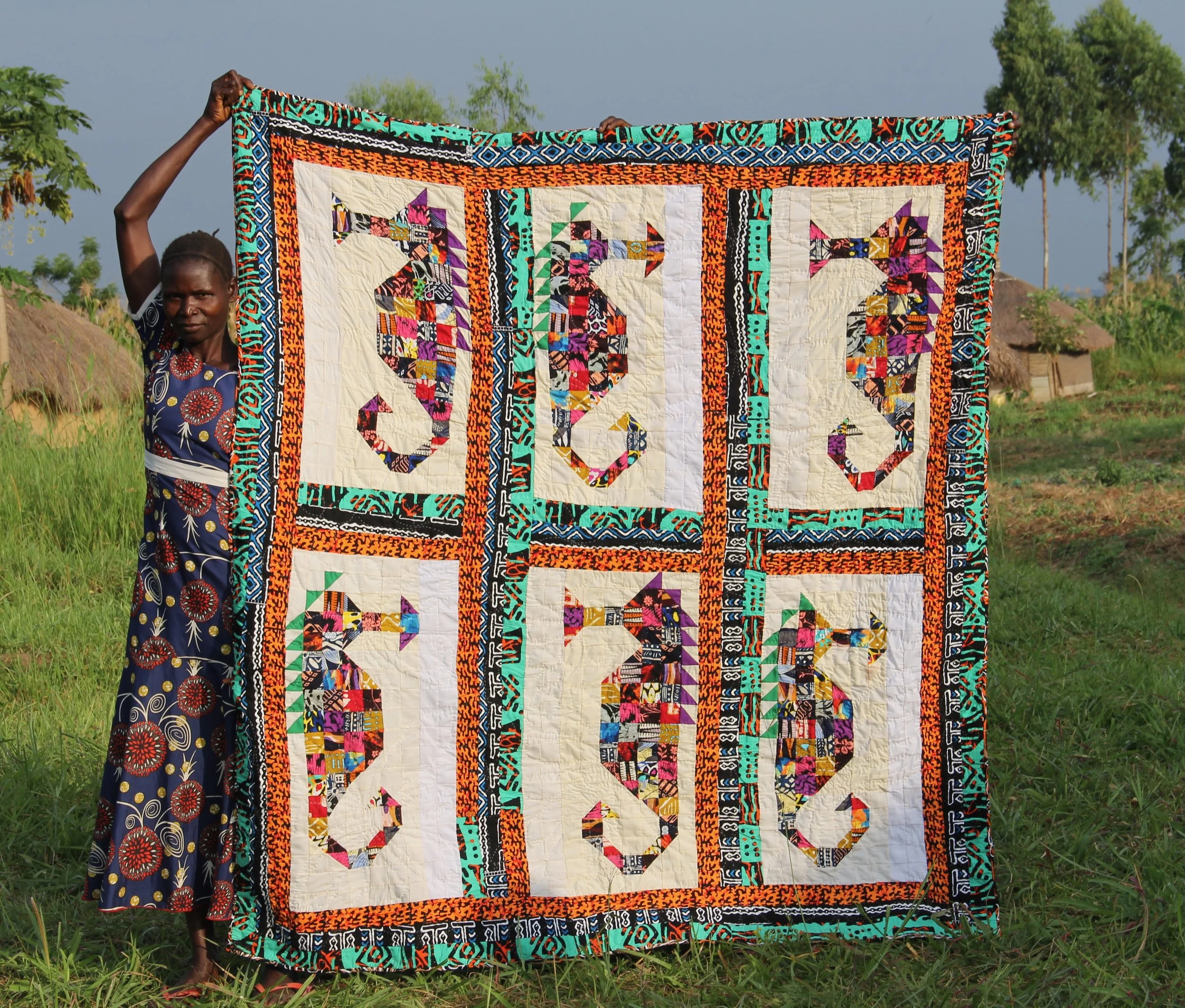 P23-26 Ajok Jennifer / Size 69" x 76" / 225,000ugx. / $61 
