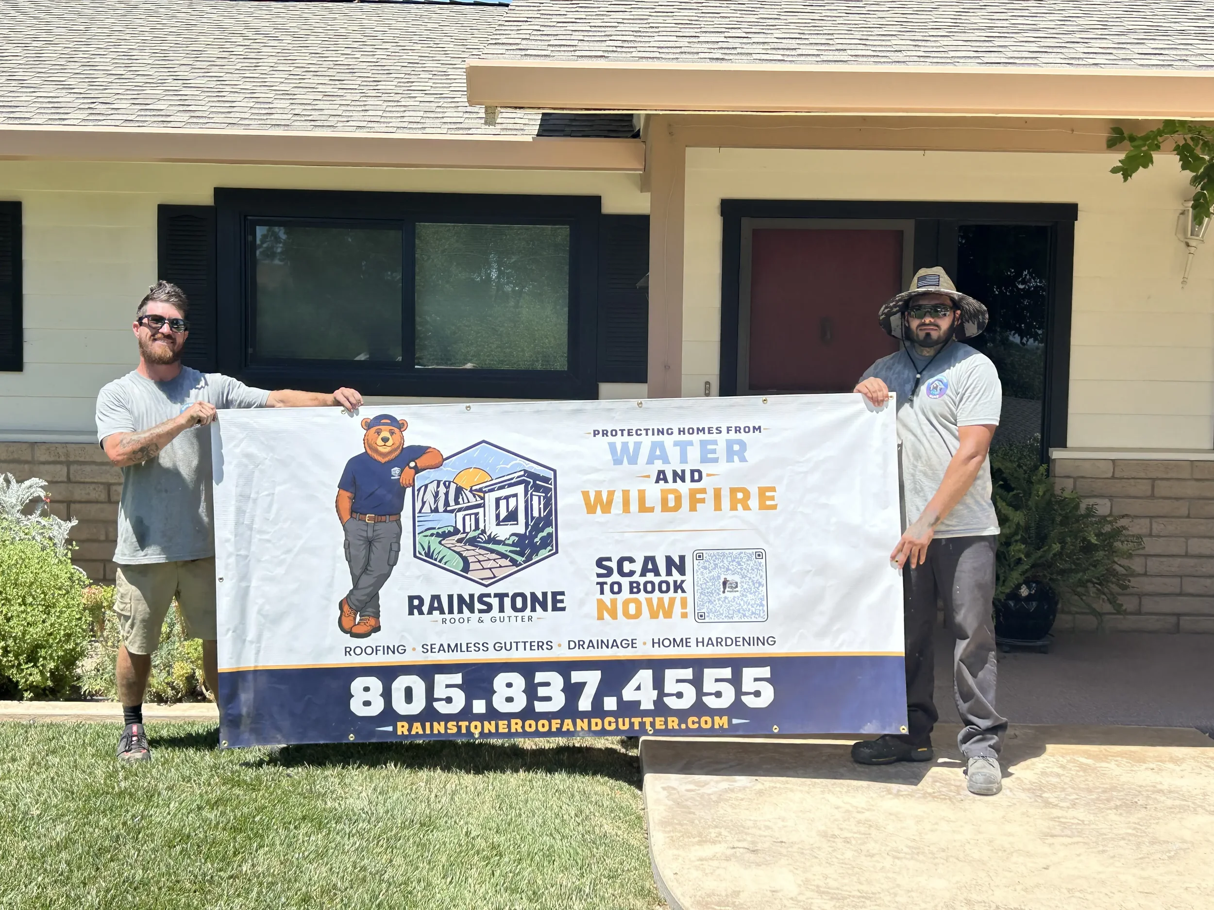 Rainstone Roof & Gutter crew at a completed residential roofing and home protection project.