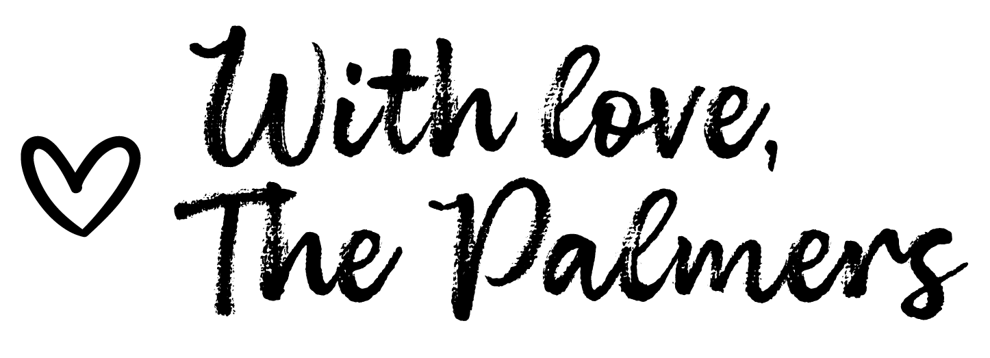 Black silhouette of a woman in bikini holding a surfboard, standing on the beach