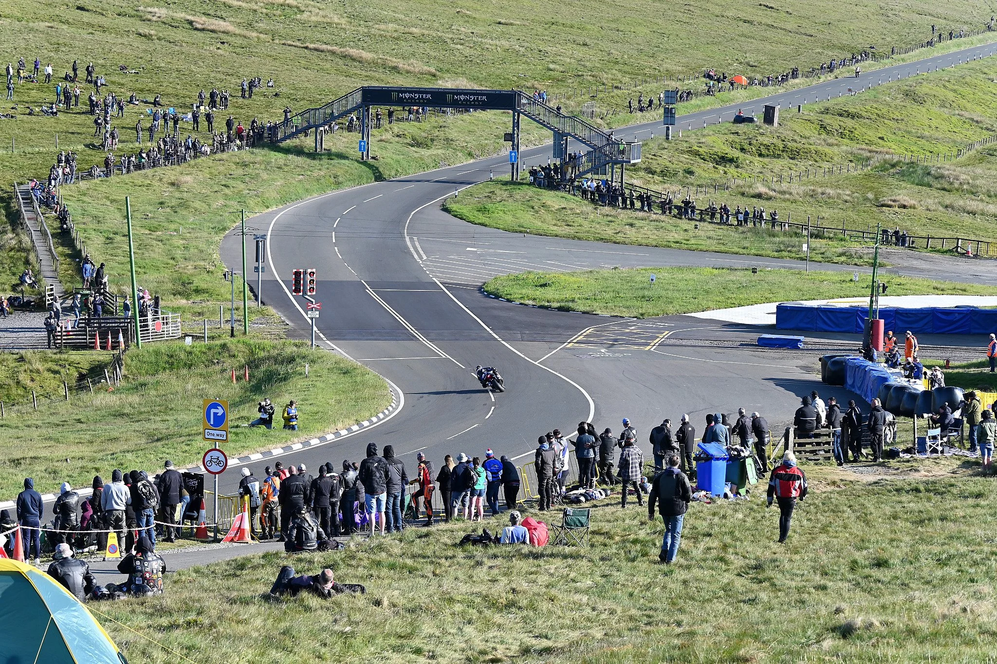 One of the more iconic spots on the Mountain Course - Bungalow. This is just below the summit of Mt. Snaefell. The Victory Cafe is located here, and just out front is a bronze statue of Joey Dunlop. Photo taken at Bungalow. 
