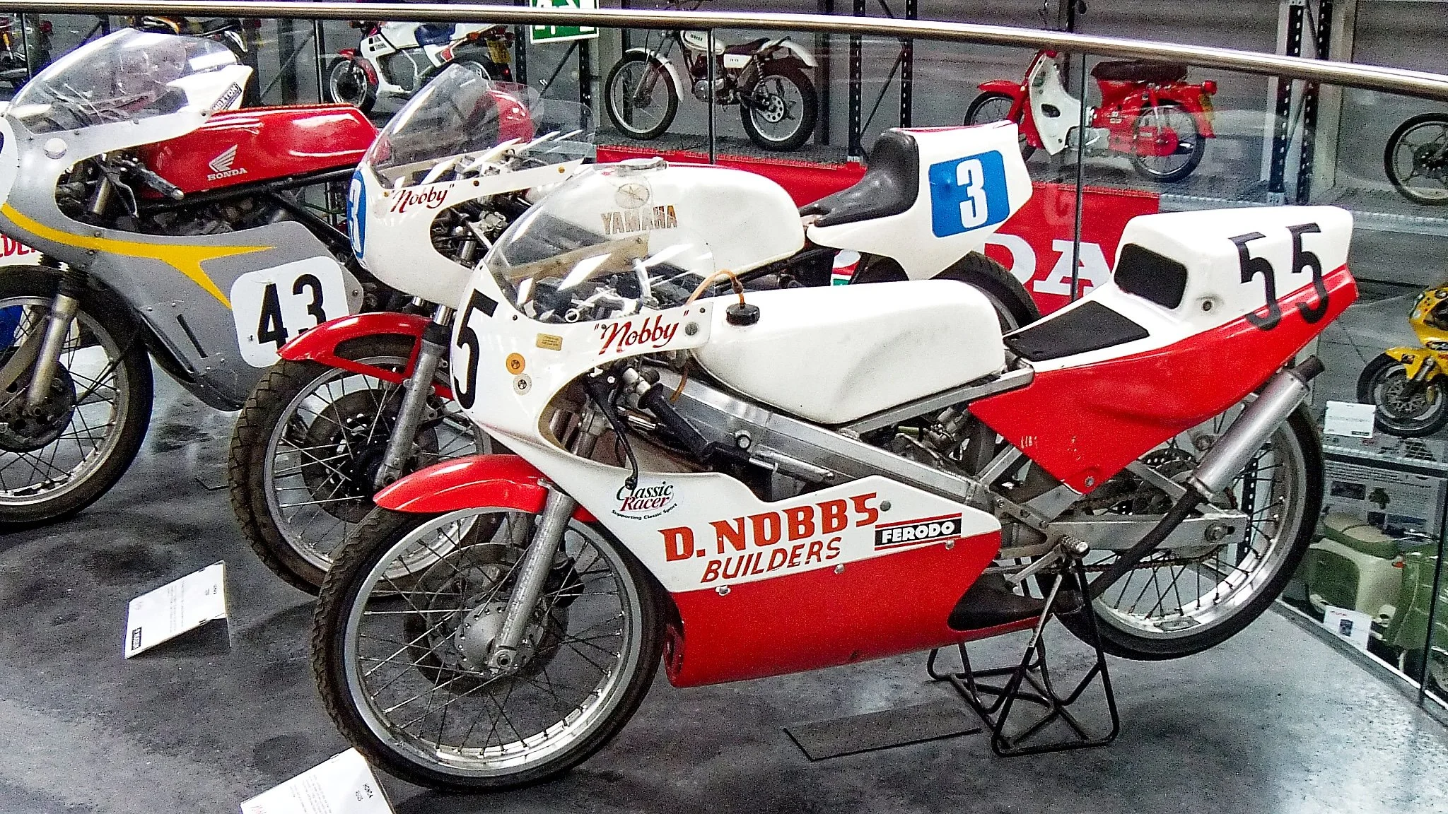 Vintage race bikes.  The Honda #43 is a Mike Hailwood 500 replica. 