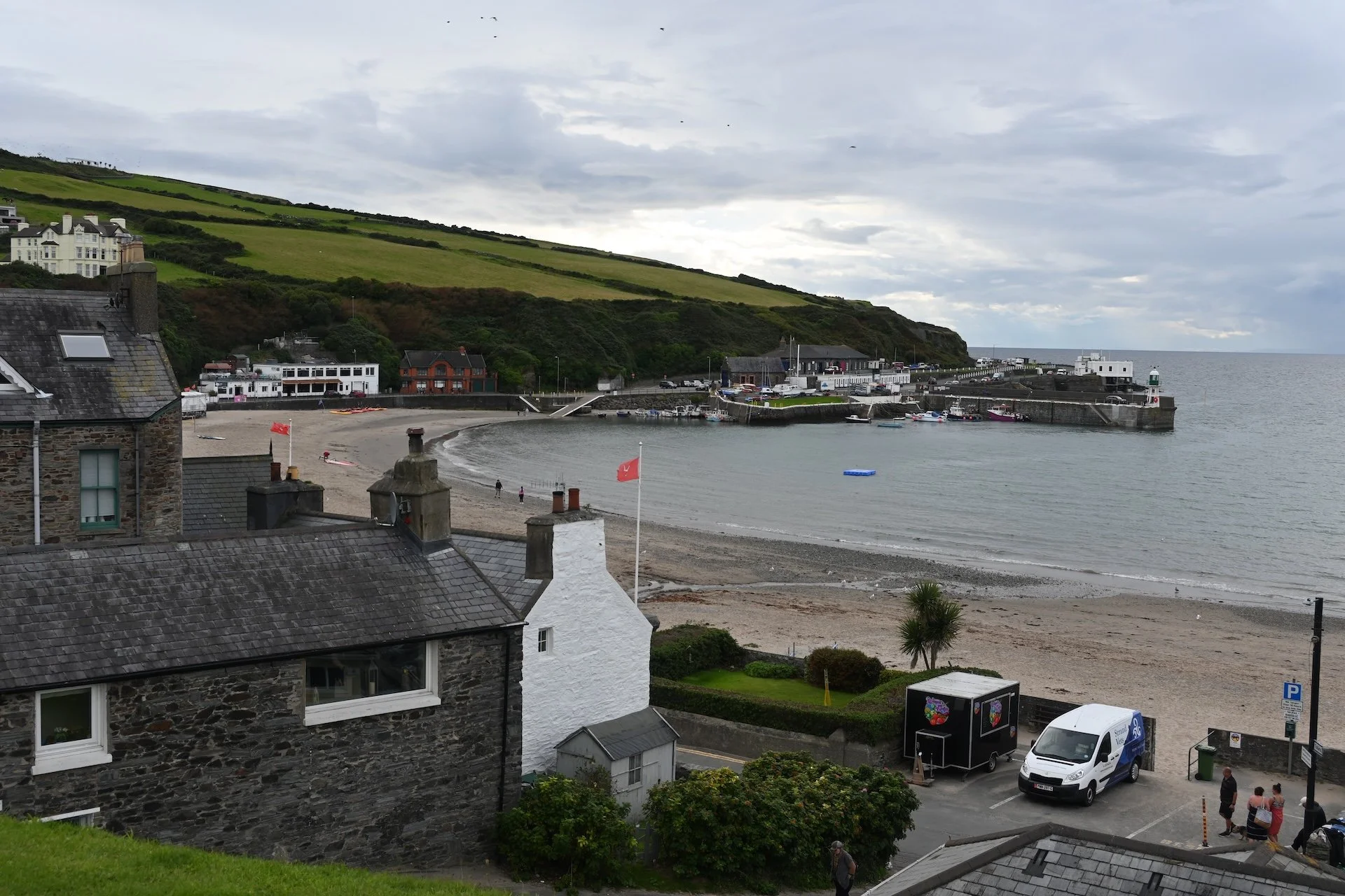 Port Erin.  The Port Erin Lifeboat Station is the white building on the right.